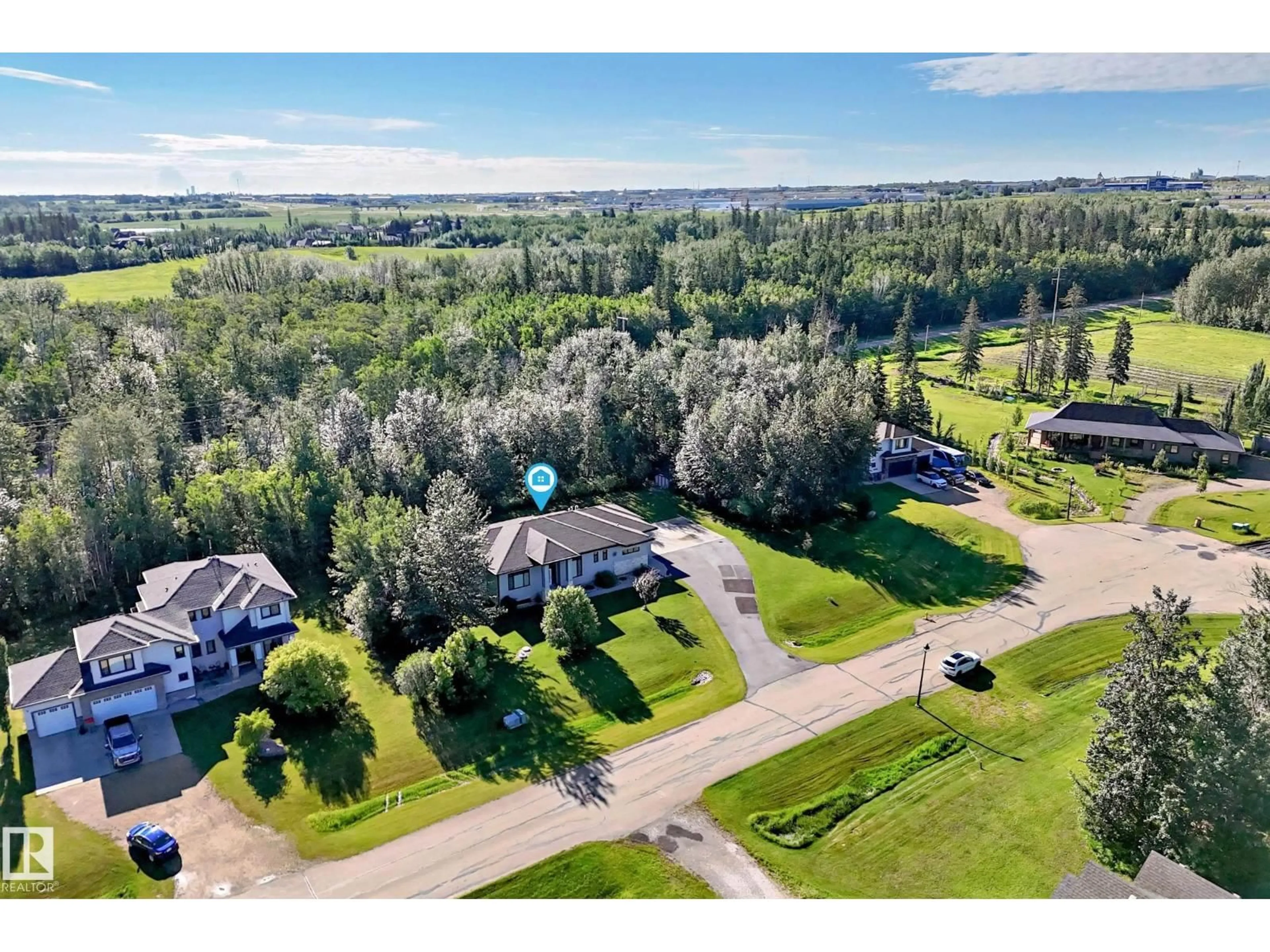 A pic from outside/outdoor area/front of a property/back of a property/a pic from drone, water/lake/river/ocean view for #7 - 53216 RGE ROAD 264 RGE ROAD, Rural Parkland County Alberta T7Y1A4