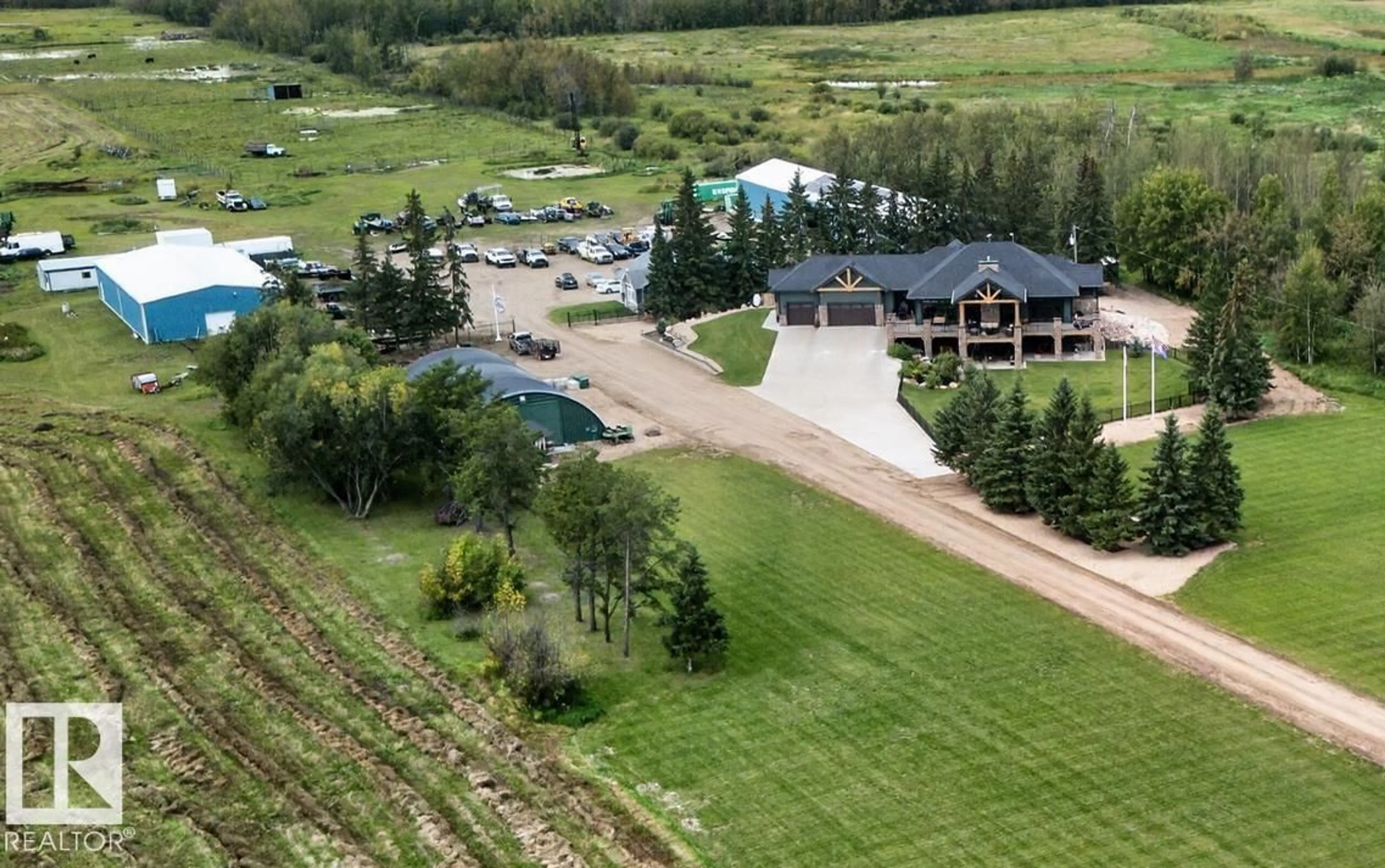 A pic from outside/outdoor area/front of a property/back of a property/a pic from drone, mountain view for 58316 RR 221, Rural Thorhild County Alberta T0A3J0