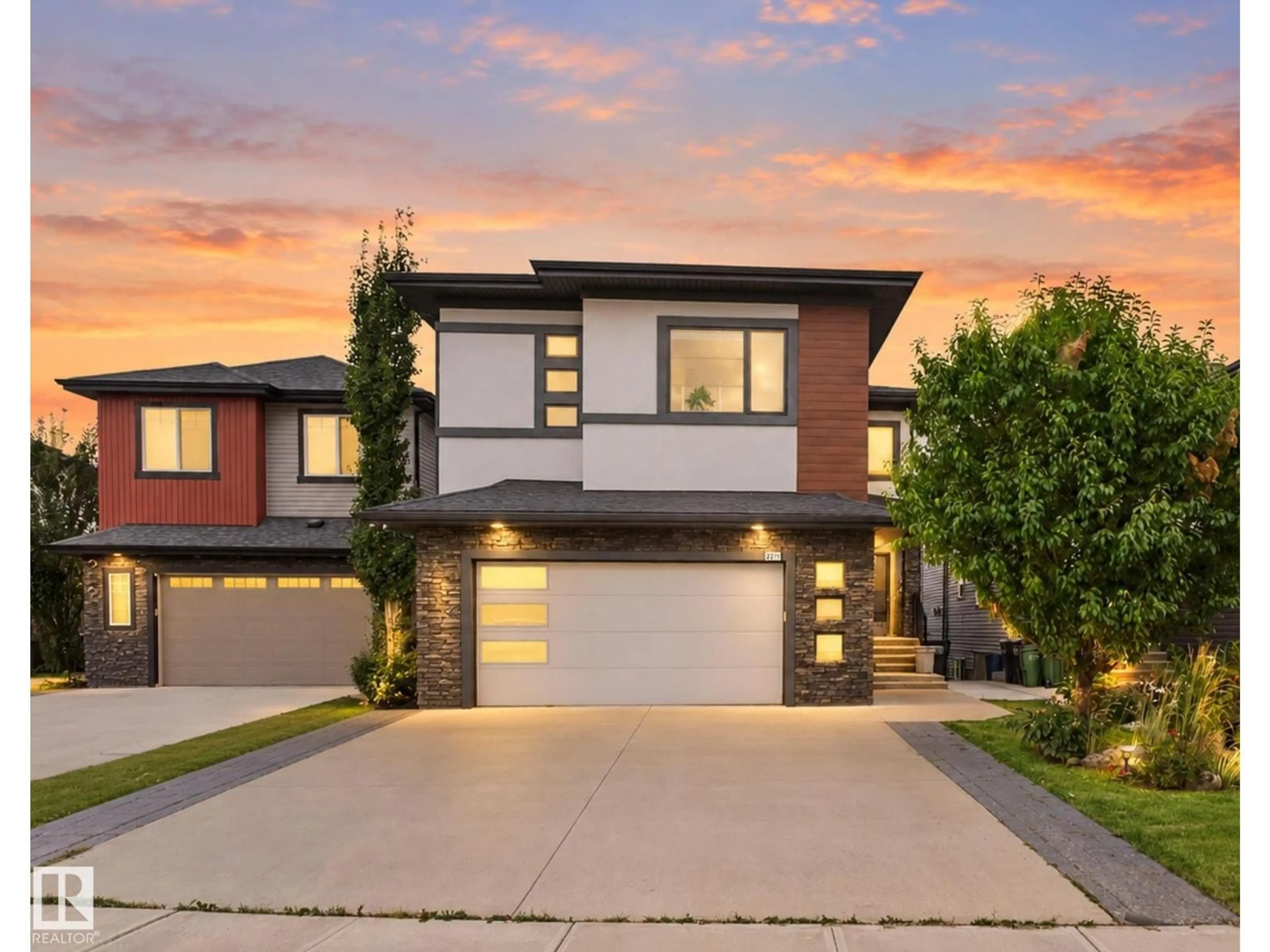 Home with brick exterior material, street for 2219 22 ST, Edmonton Alberta T6T0Z1