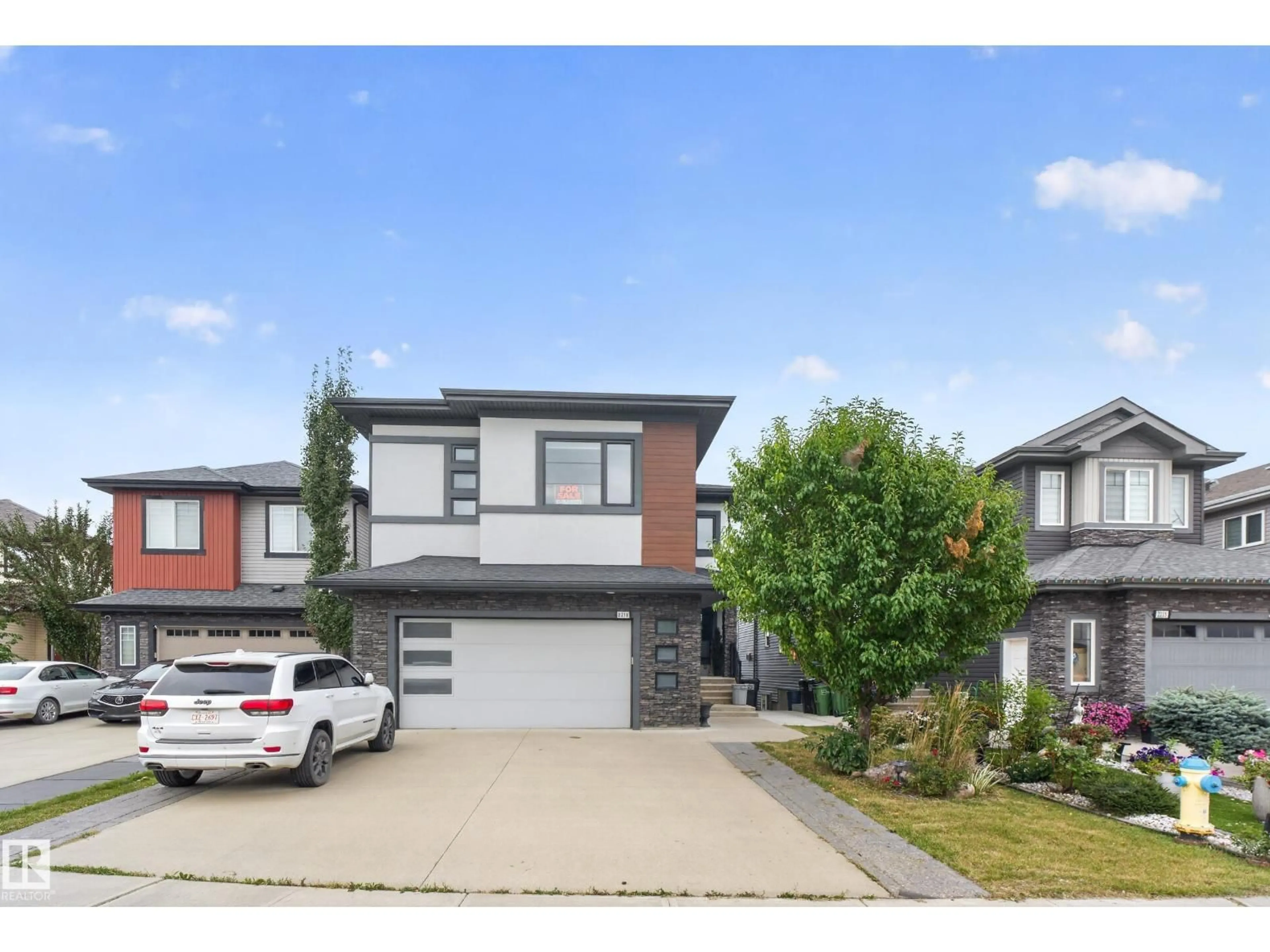 Home with brick exterior material, street for 2219 22 ST, Edmonton Alberta T6T0Z1