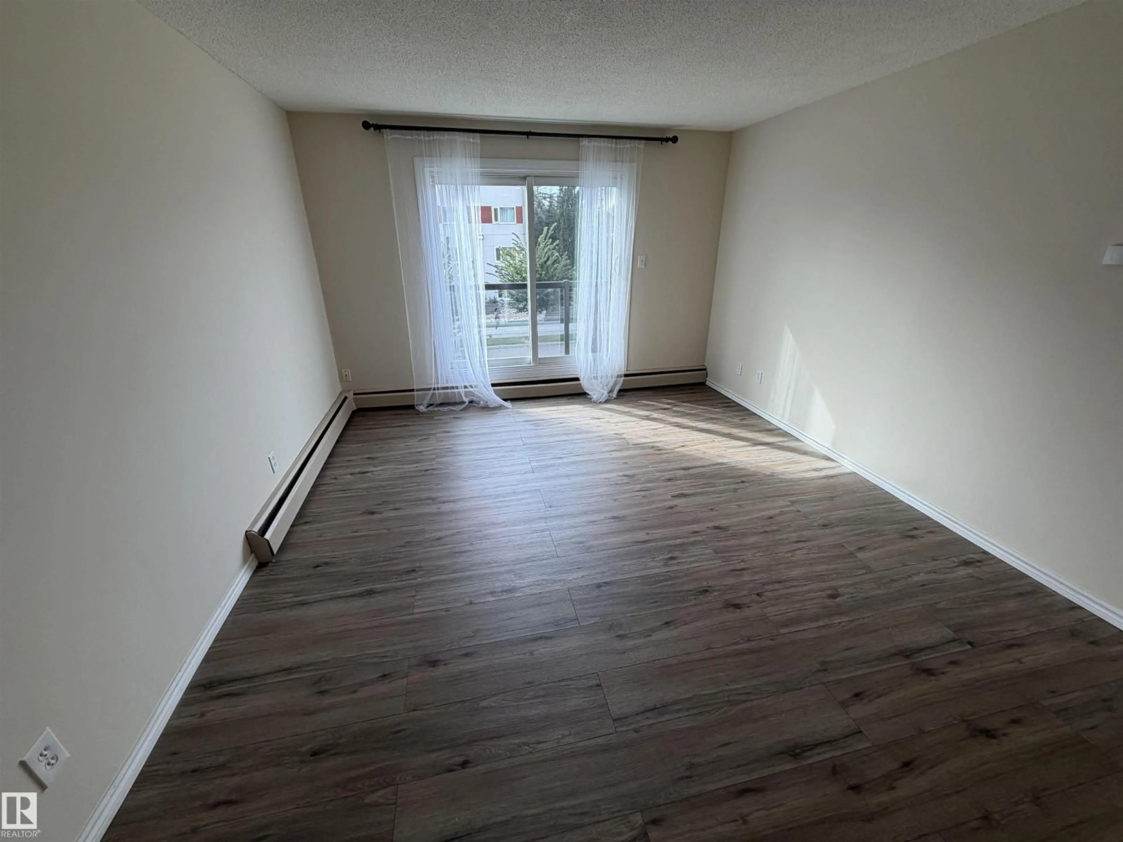 A pic of a room for #209 - 11429 124 ST, Edmonton Alberta T5M0K4