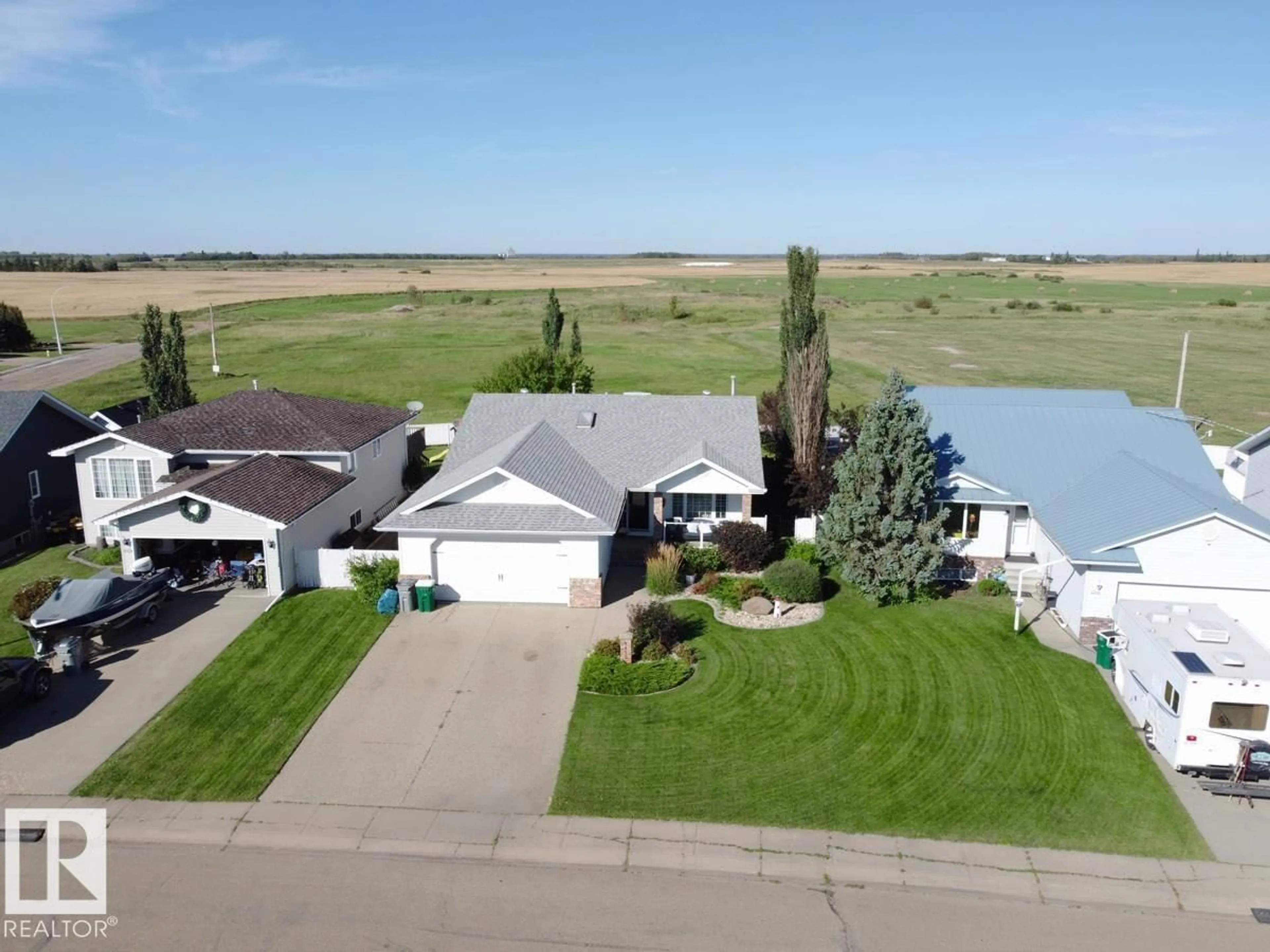 A pic from outside/outdoor area/front of a property/back of a property/a pic from drone, water/lake/river/ocean view for 4420 56 AV, Lamont Alberta T0B2R0