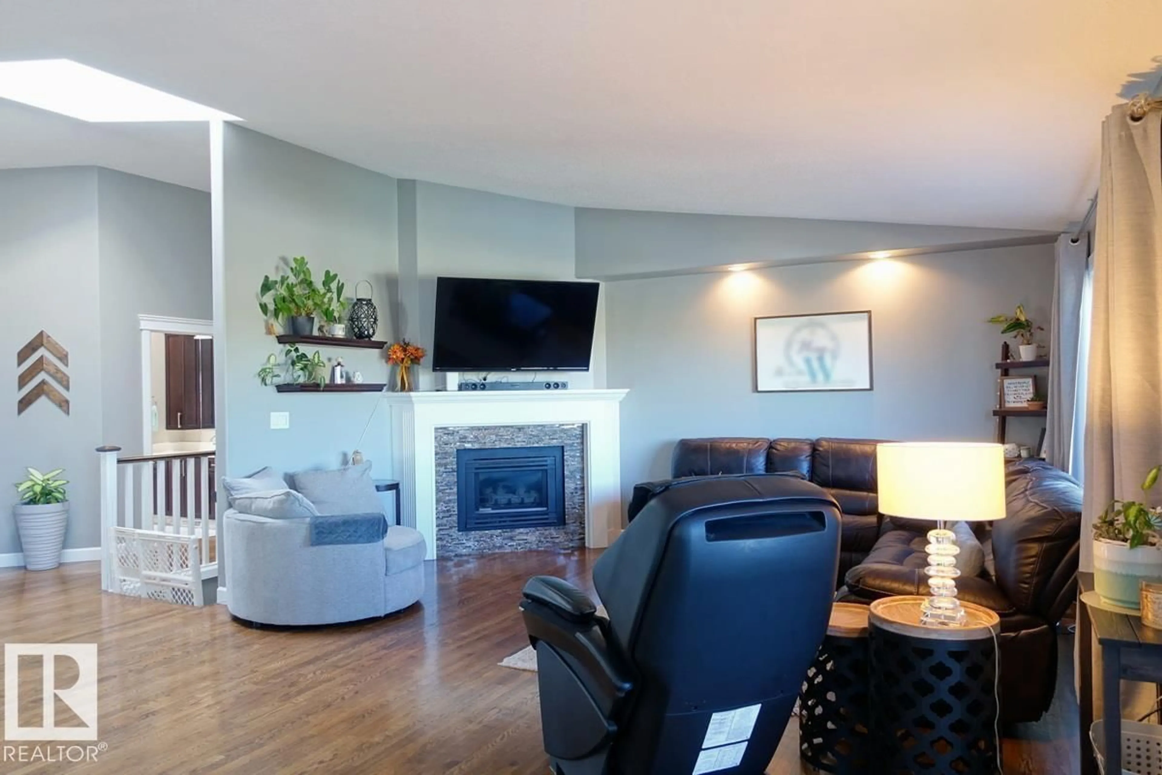 Living room with furniture, wood/laminate floor for 4420 56 AV, Lamont Alberta T0B2R0