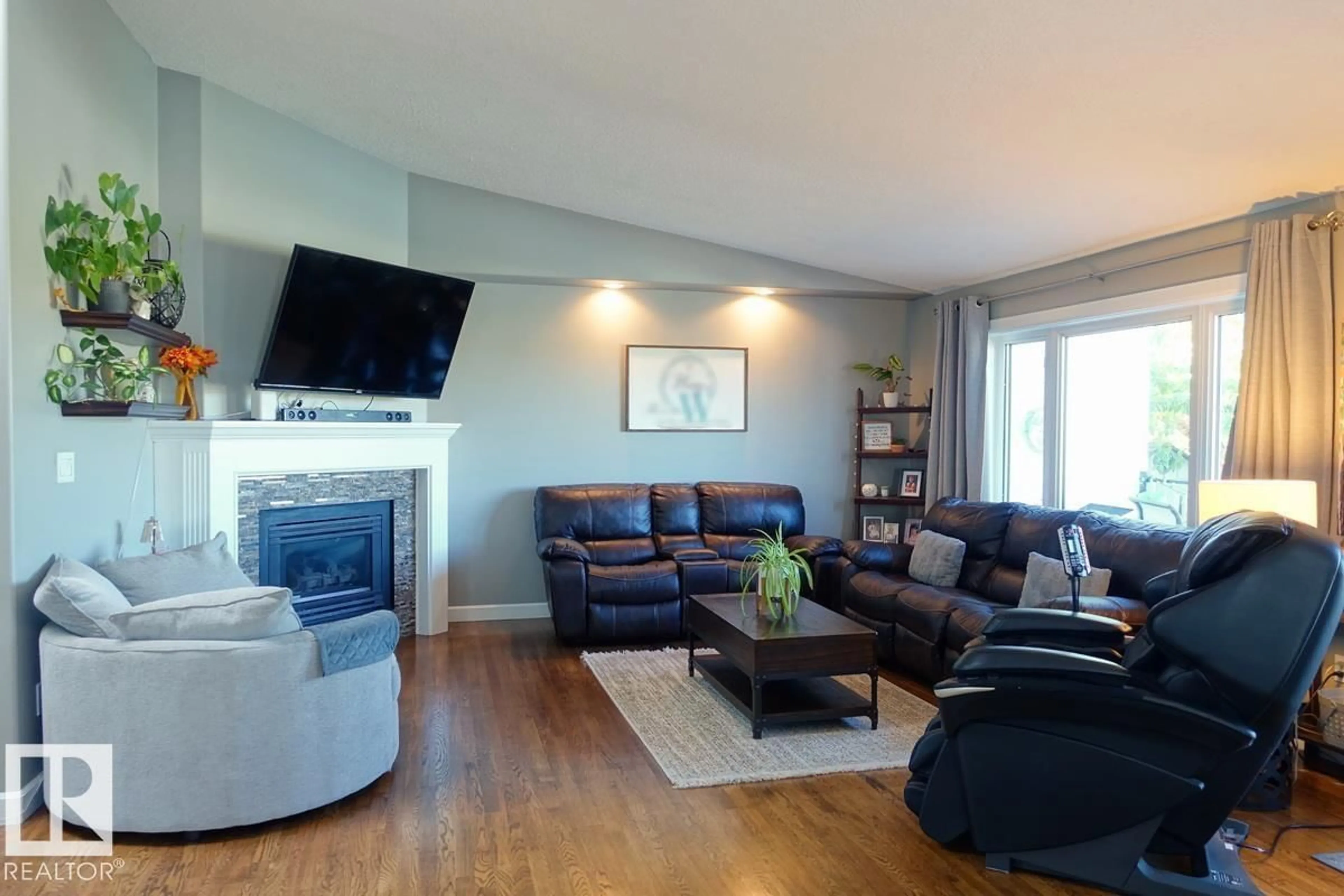 Living room with furniture, wood/laminate floor for 4420 56 AV, Lamont Alberta T0B2R0