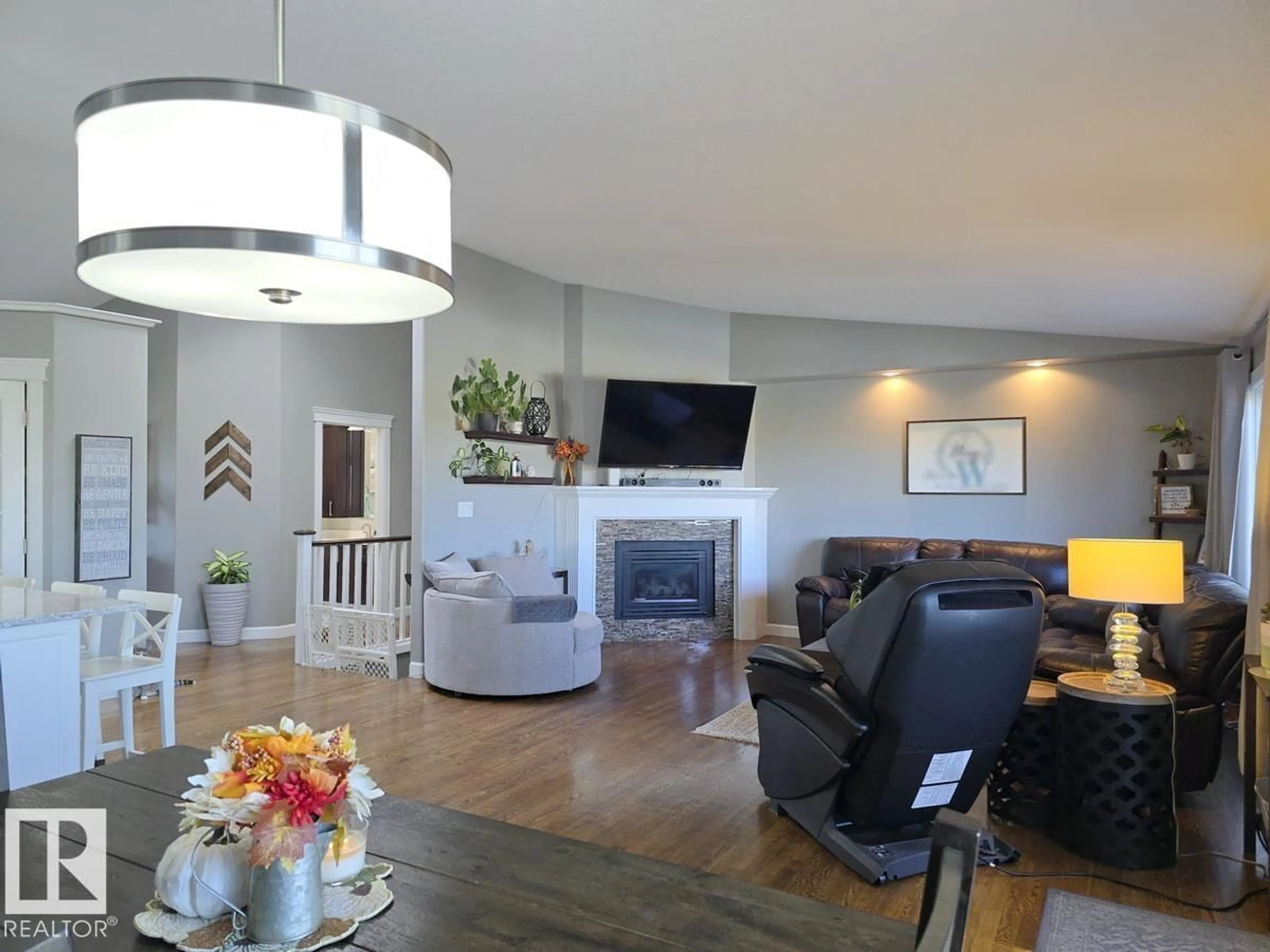 Living room with furniture, wood/laminate floor for 4420 56 AV, Lamont Alberta T0B2R0