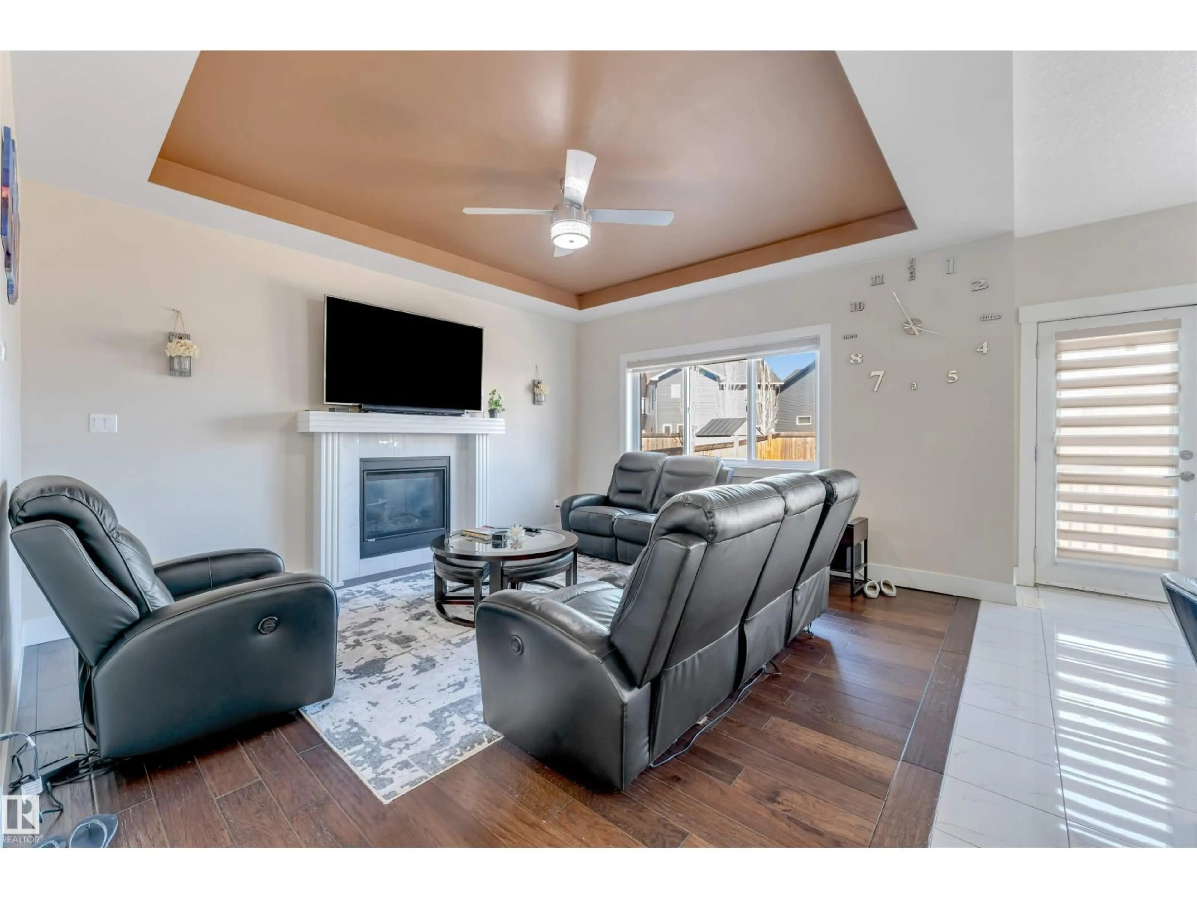Living room with furniture, wood/laminate floor for 1943 ADAMSON TC, Edmonton Alberta T6W1A8