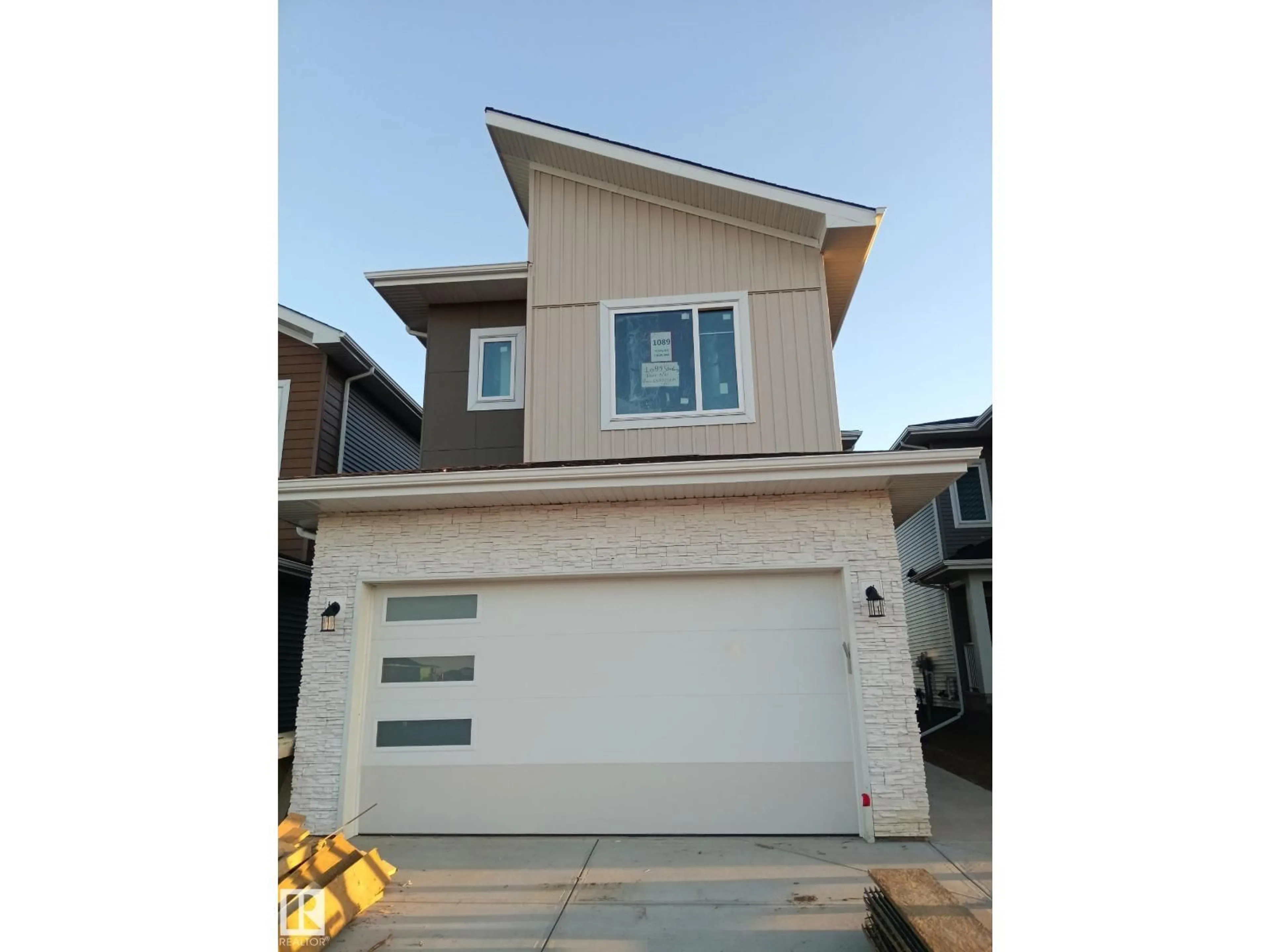Home with vinyl exterior material, street for 1089 STARLING DR, Edmonton Alberta T5S0V4
