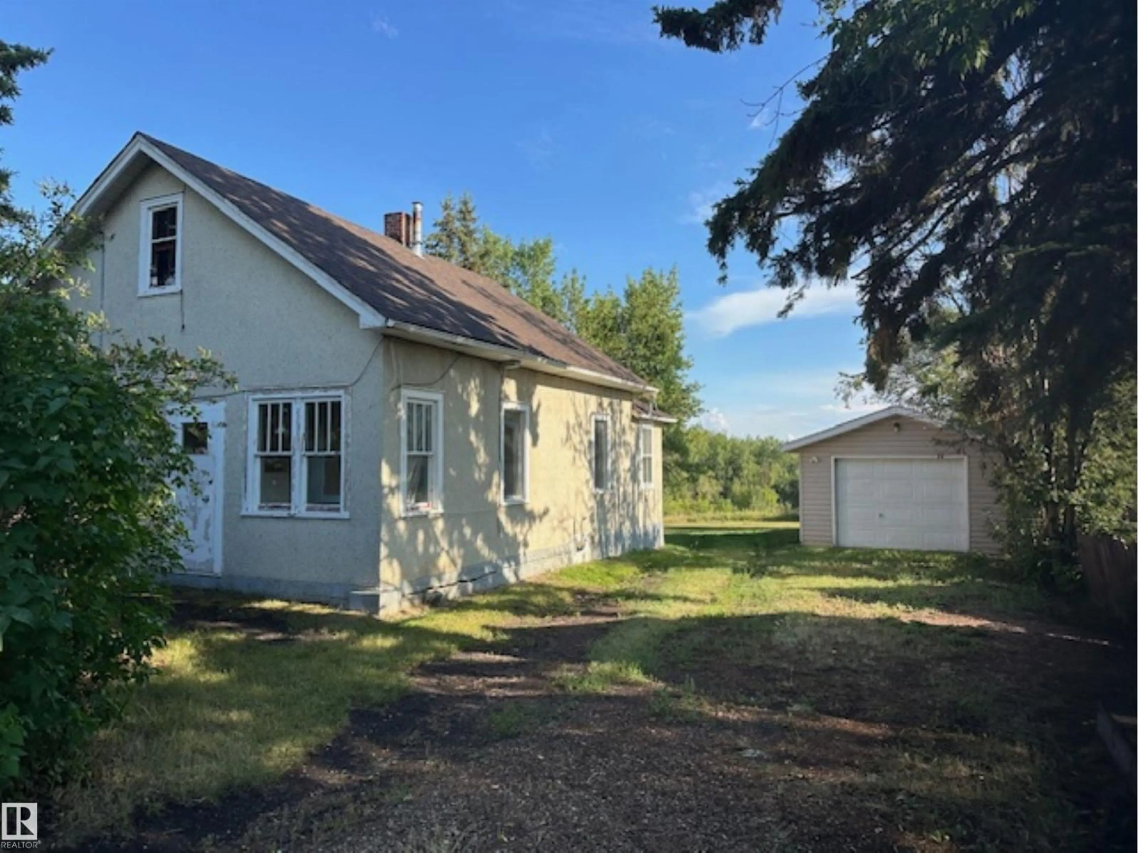 A pic from outside/outdoor area/front of a property/back of a property/a pic from drone, street for 4711 51 AV, Waskatenau Alberta T0A3P0