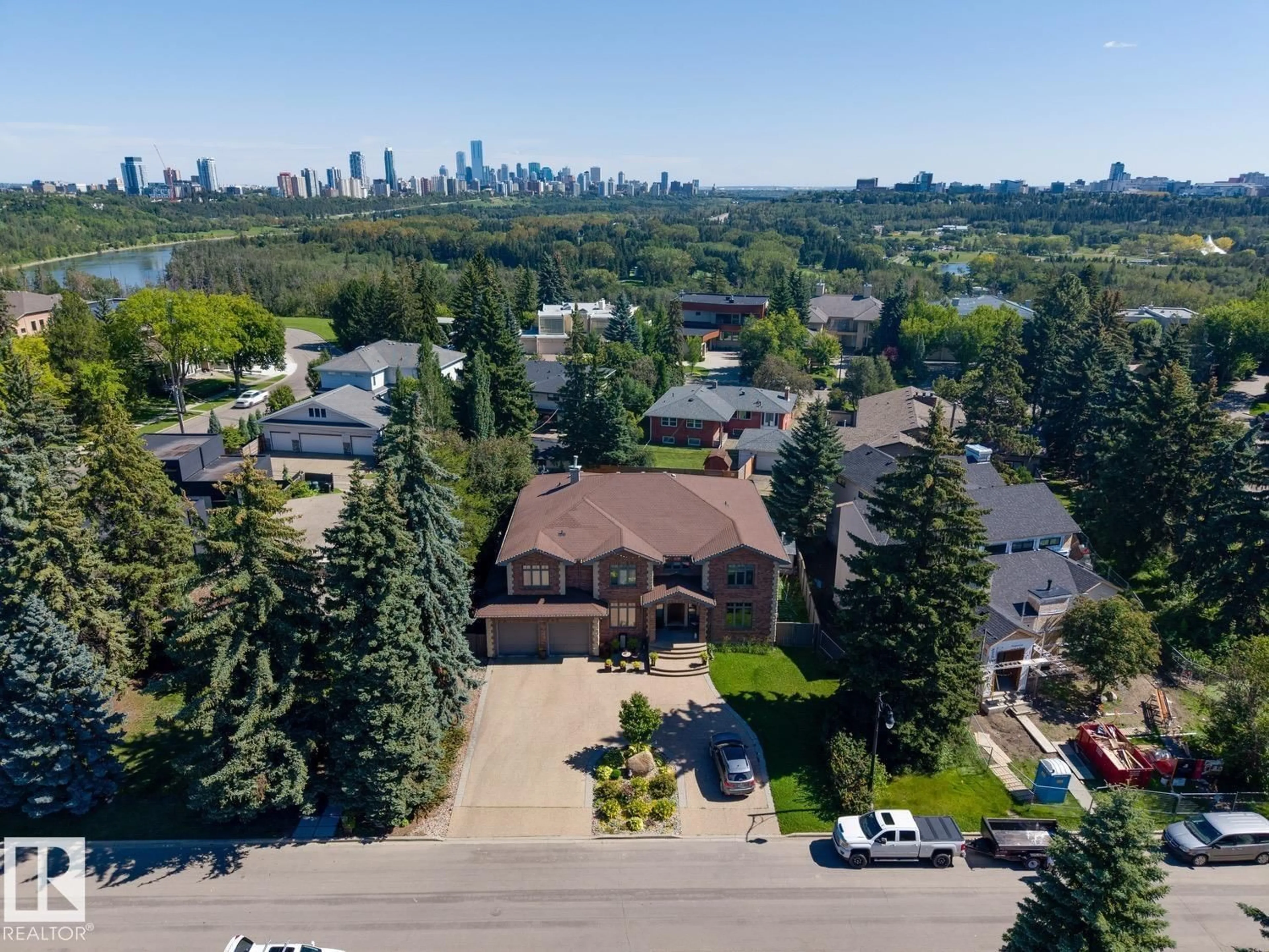 A pic from outside/outdoor area/front of a property/back of a property/a pic from drone, city buildings view from balcony for 5 RIVERSIDE CR, Edmonton Alberta T5N3M4