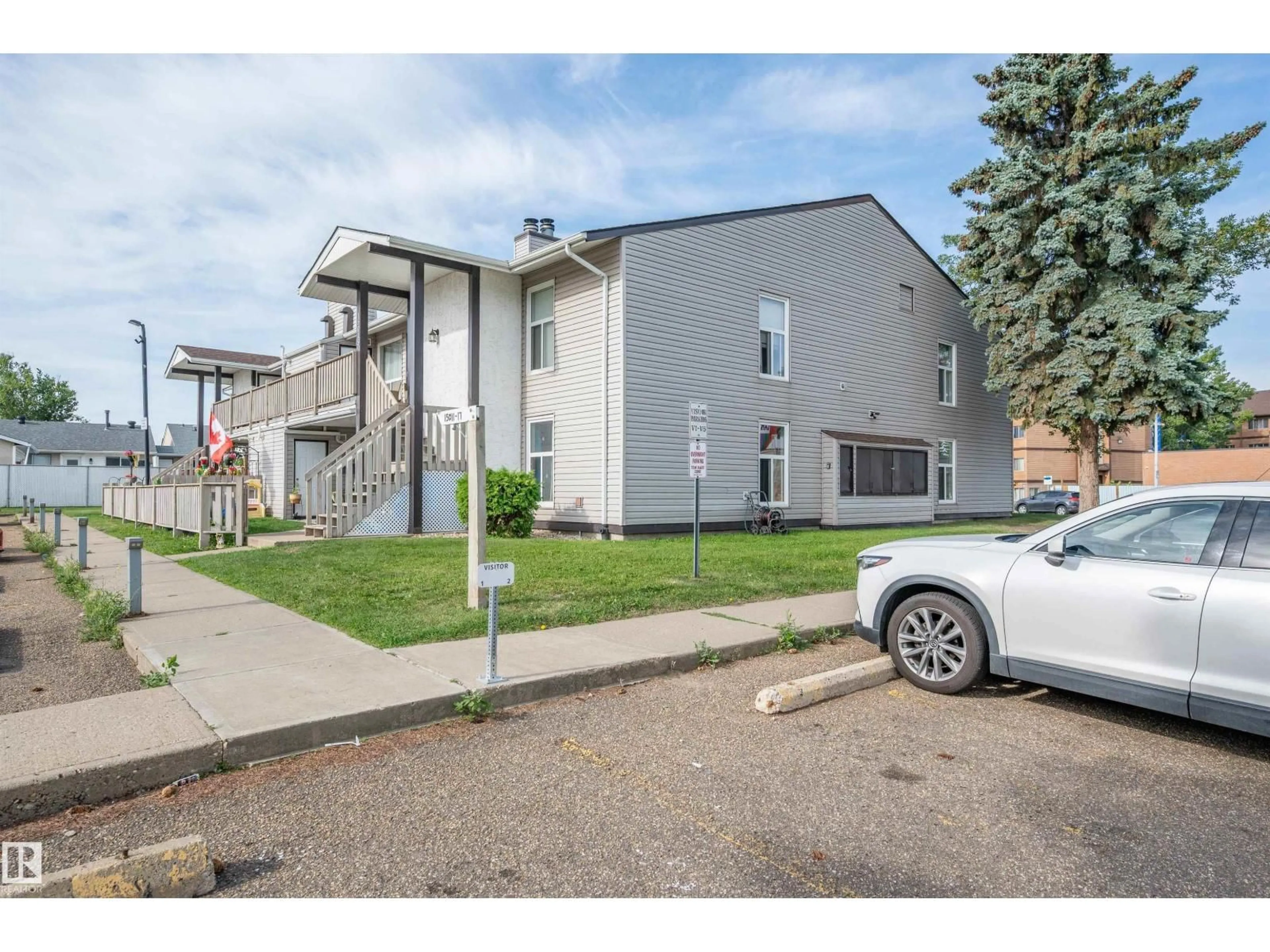 A pic from outside/outdoor area/front of a property/back of a property/a pic from drone, street for 15017 26 ST, Edmonton Alberta T5Y2G6