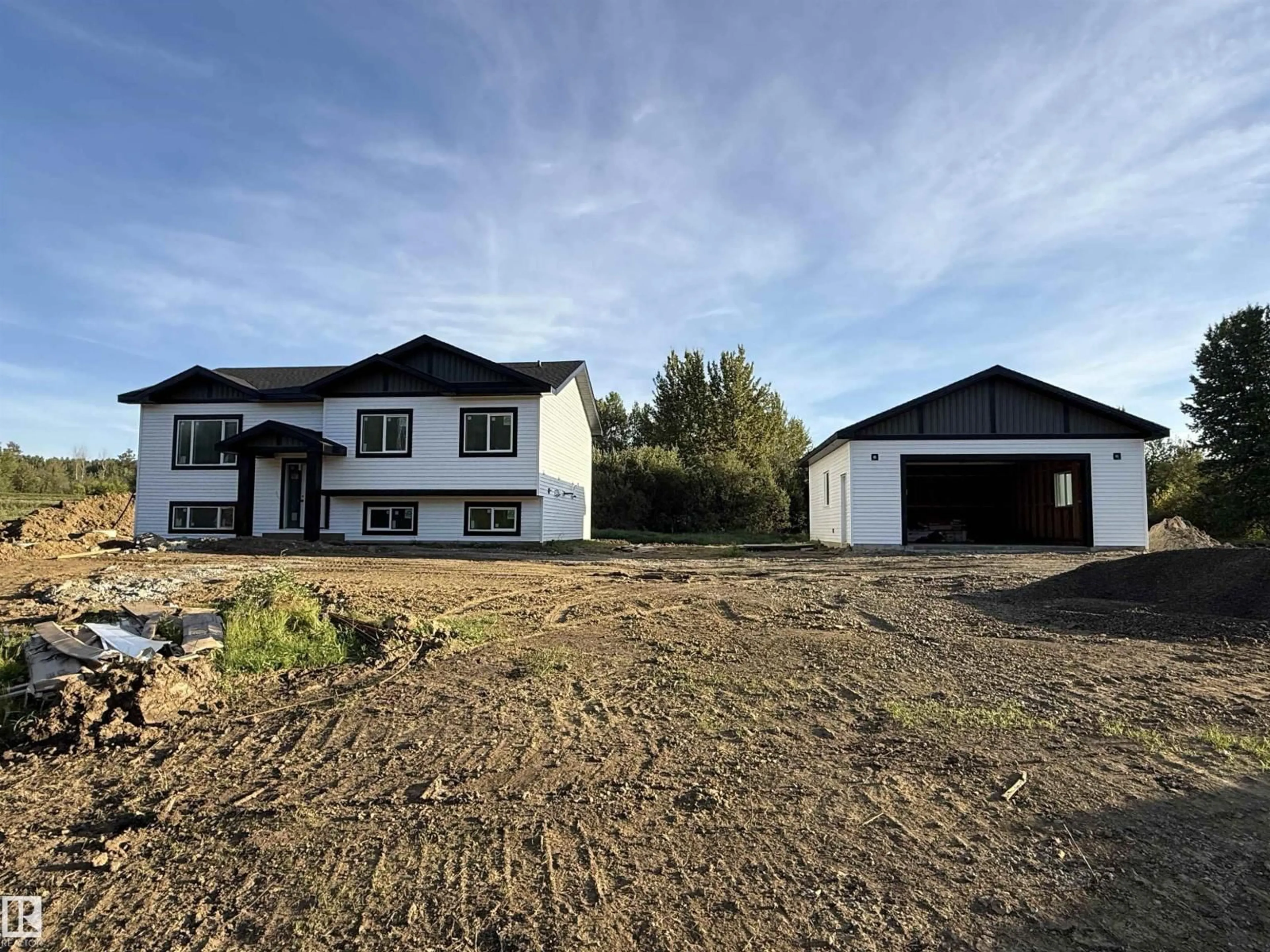 A pic from outside/outdoor area/front of a property/back of a property/a pic from drone, building for #14 - 52510 RGE ROAD 25, Rural Parkland County Alberta T7Y2M2