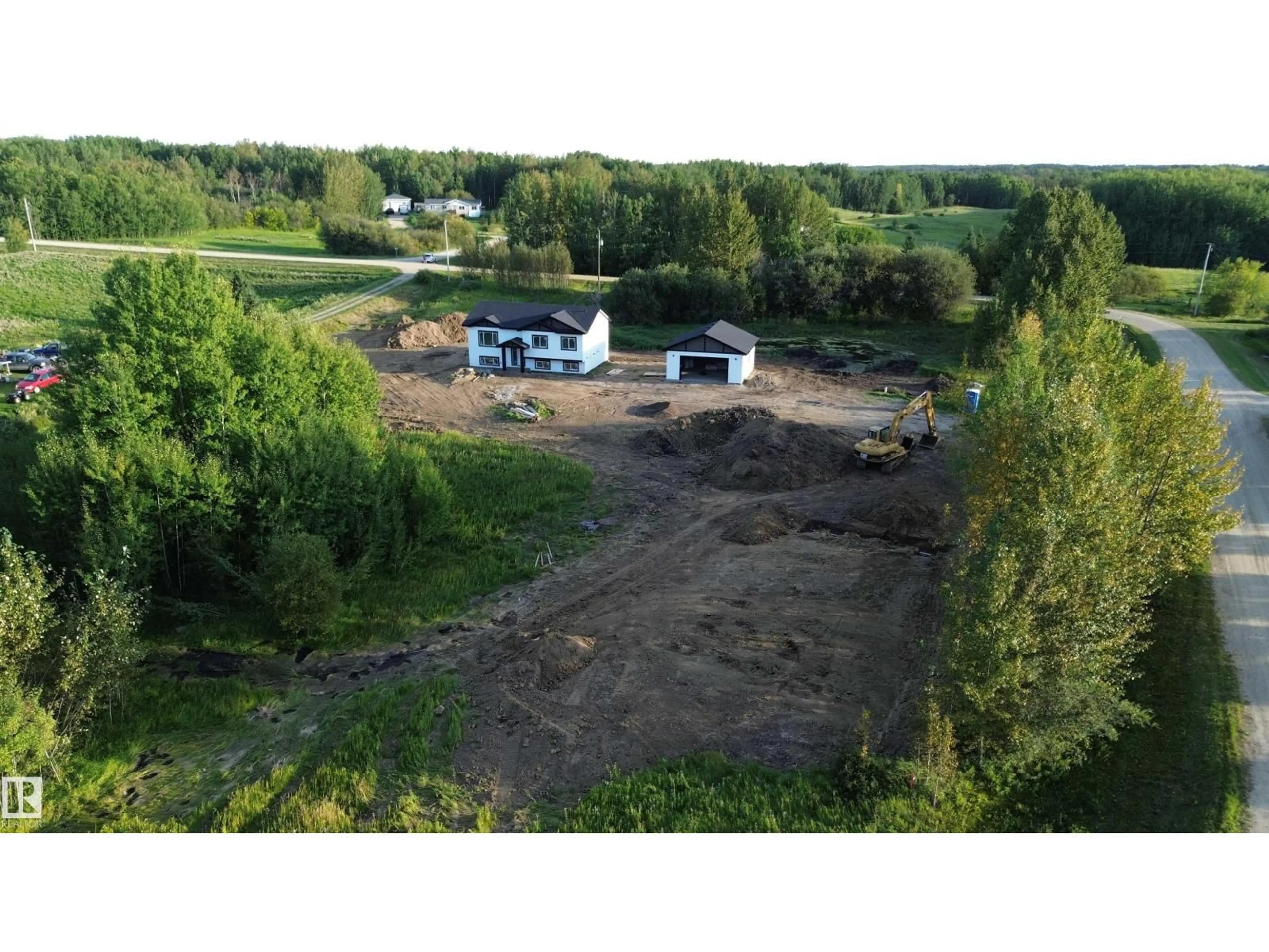 A pic from outside/outdoor area/front of a property/back of a property/a pic from drone, building for #14 - 52510 RGE ROAD 25, Rural Parkland County Alberta T7Y2M2