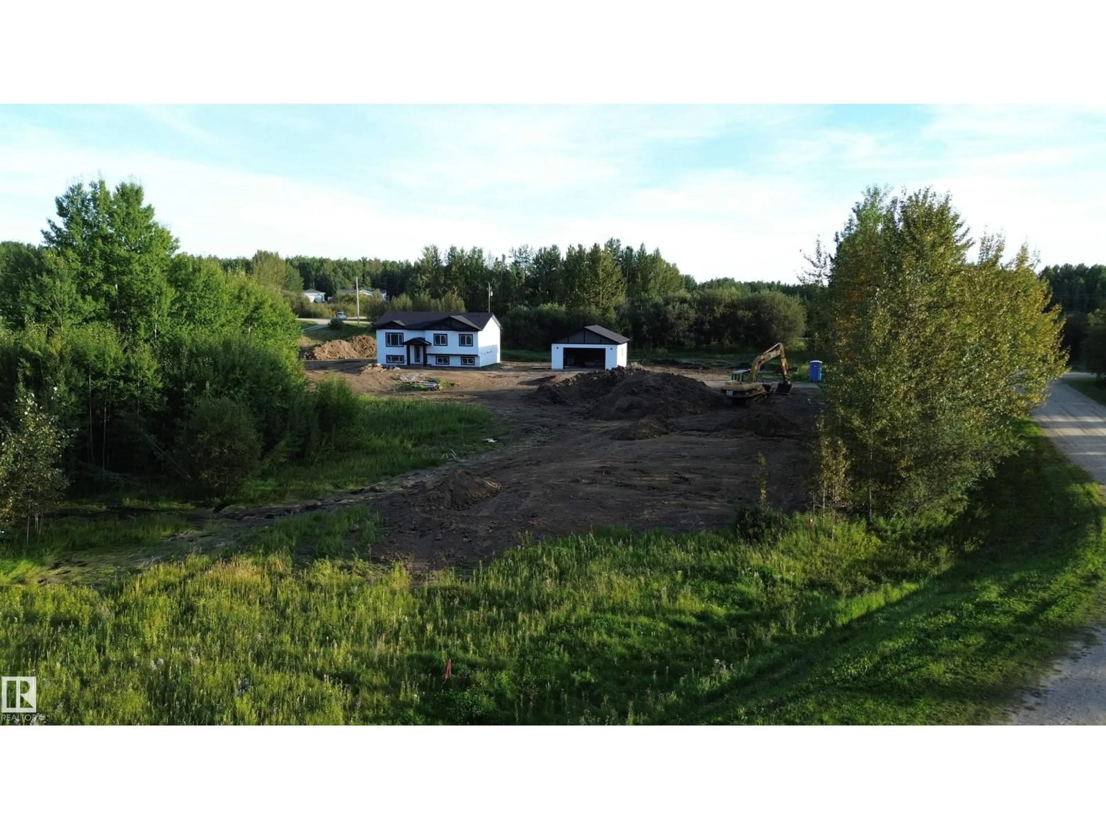 A pic from outside/outdoor area/front of a property/back of a property/a pic from drone, unknown for #14 - 52510 RGE ROAD 25, Rural Parkland County Alberta T7Y2M2