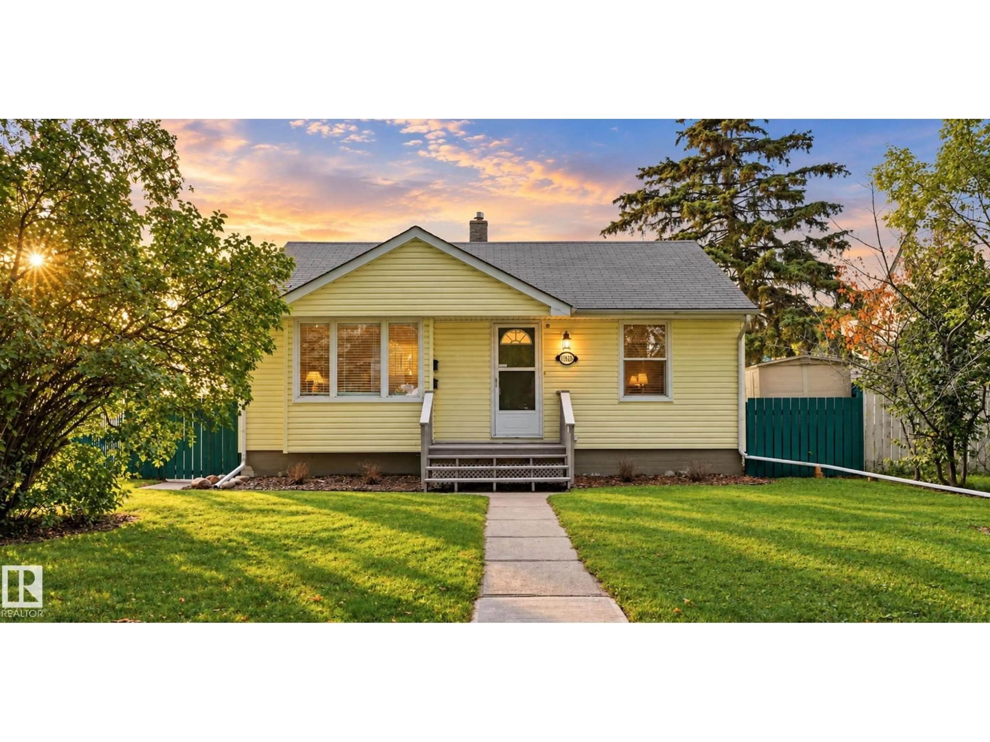 Home with vinyl exterior material, street for 11836 62 ST, Edmonton Alberta T5W4C4