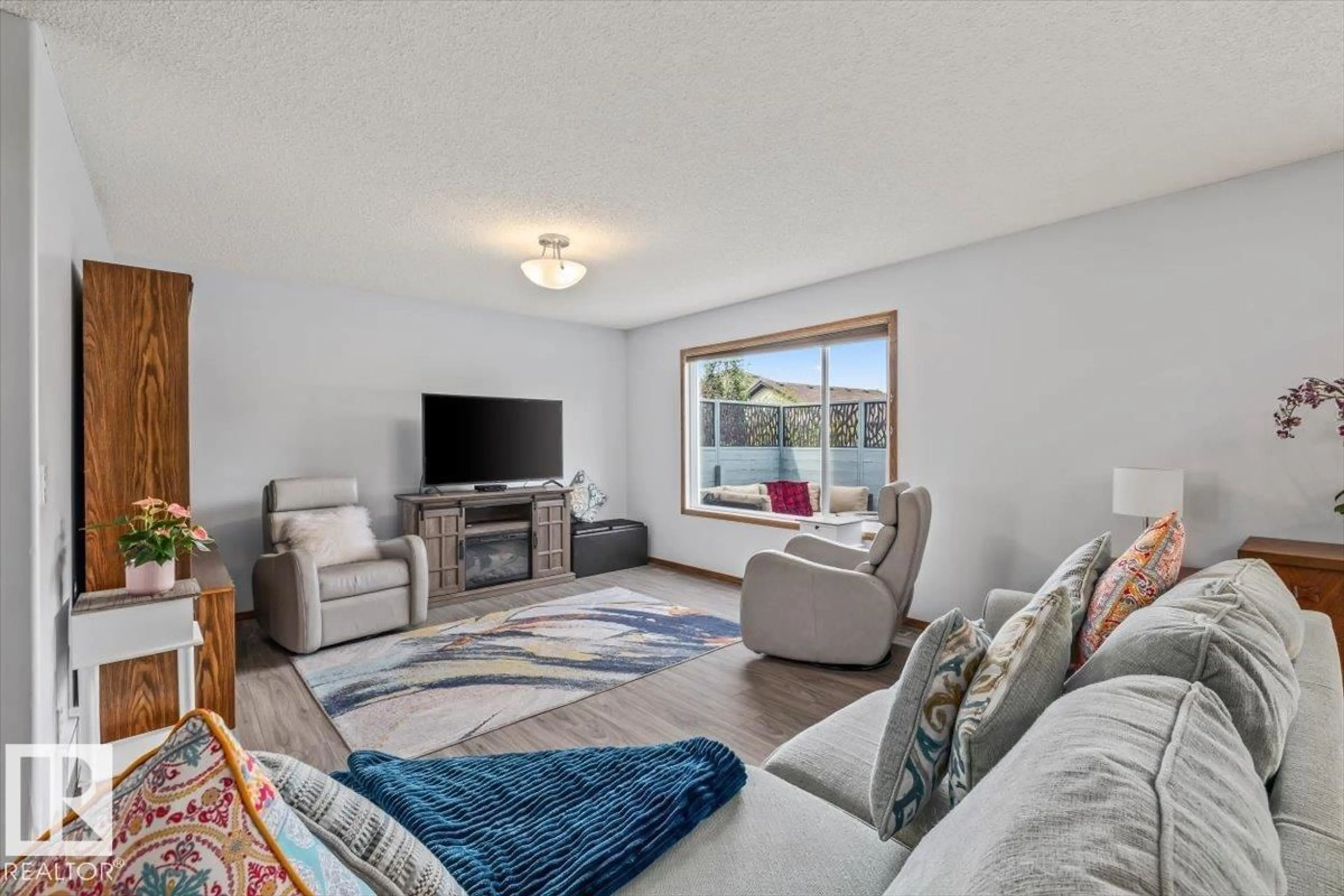 Living room with furniture, unknown for 6014 48, Beaumont Alberta T4X0A3