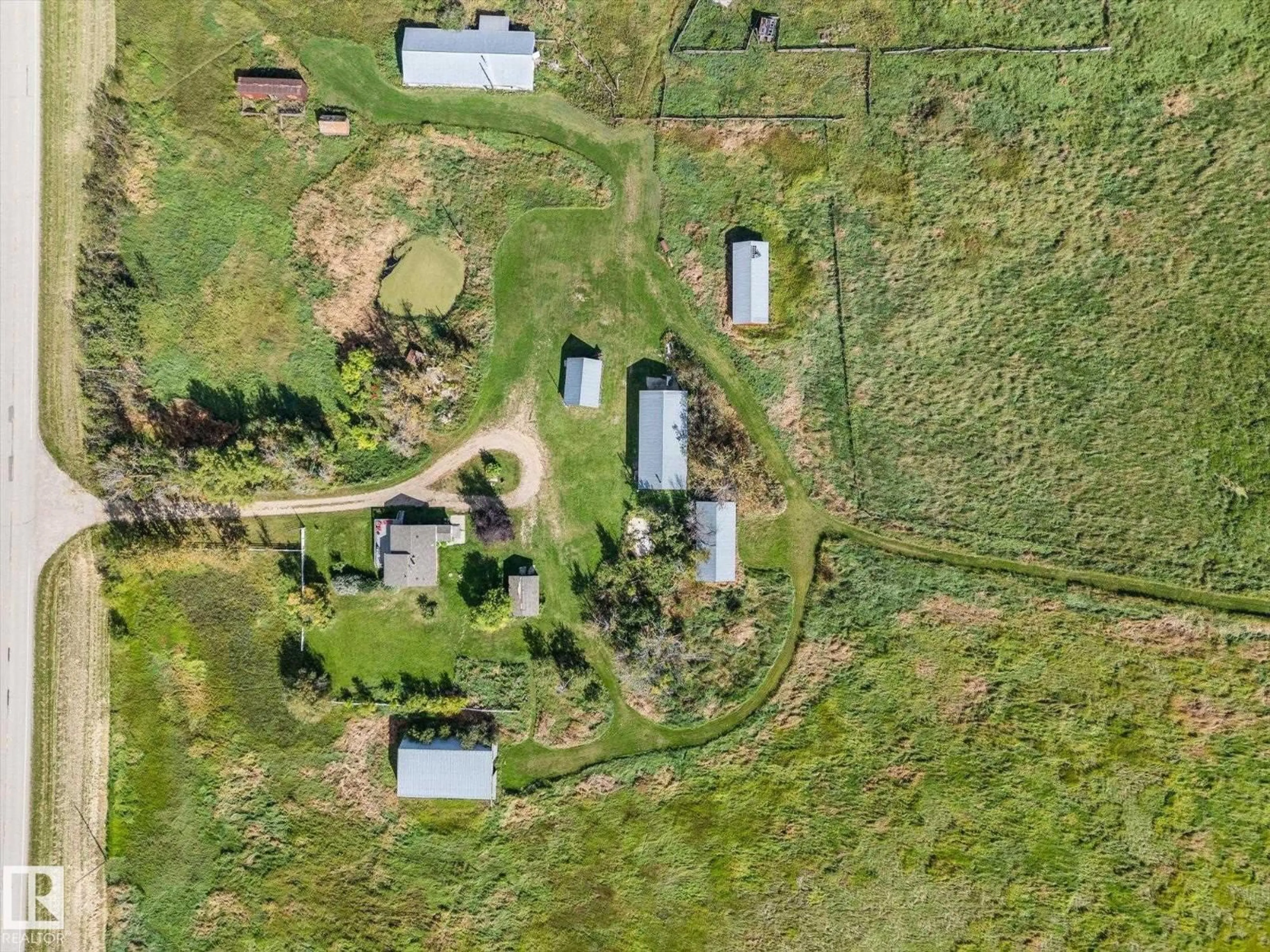 A pic from outside/outdoor area/front of a property/back of a property/a pic from drone, unknown for 55431 HWY 777, Rural Lac Ste. Anne County Alberta T0E1V0