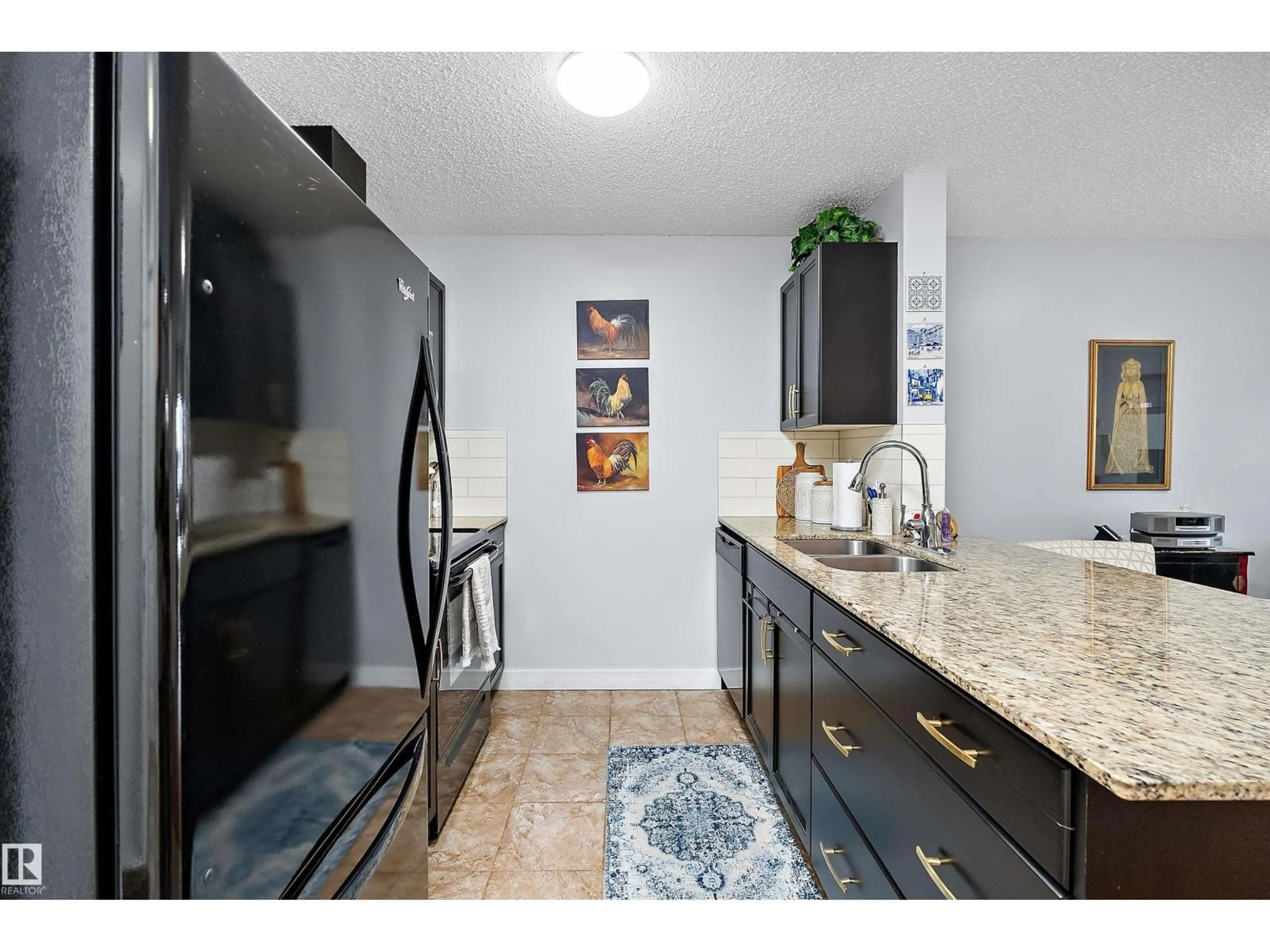 Open concept kitchen, unknown for 109 - 12660 142 AV, Edmonton Alberta T5X0J5