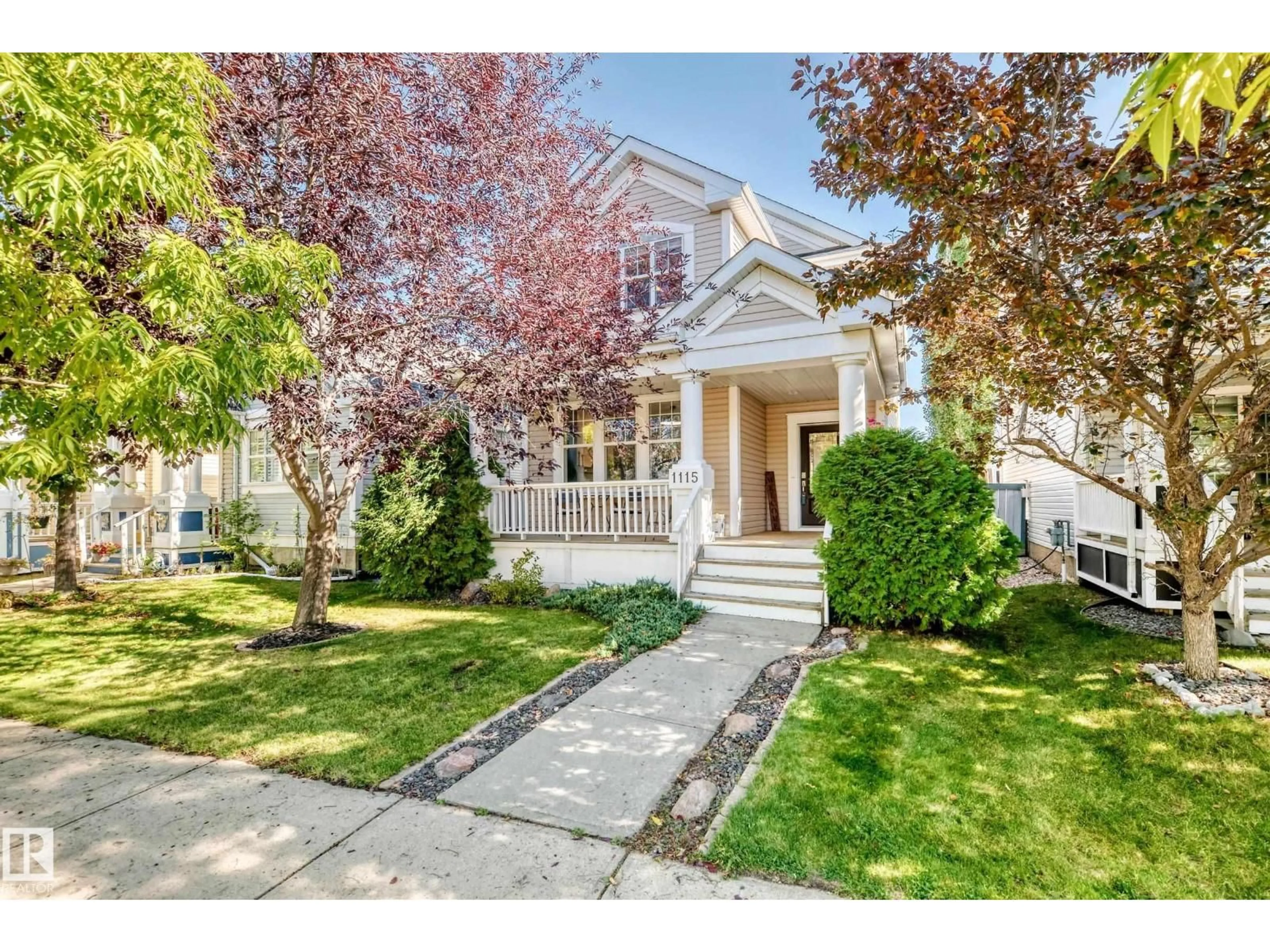 Home with vinyl exterior material, street for 1115 80 ST, Edmonton Alberta T6X1E6