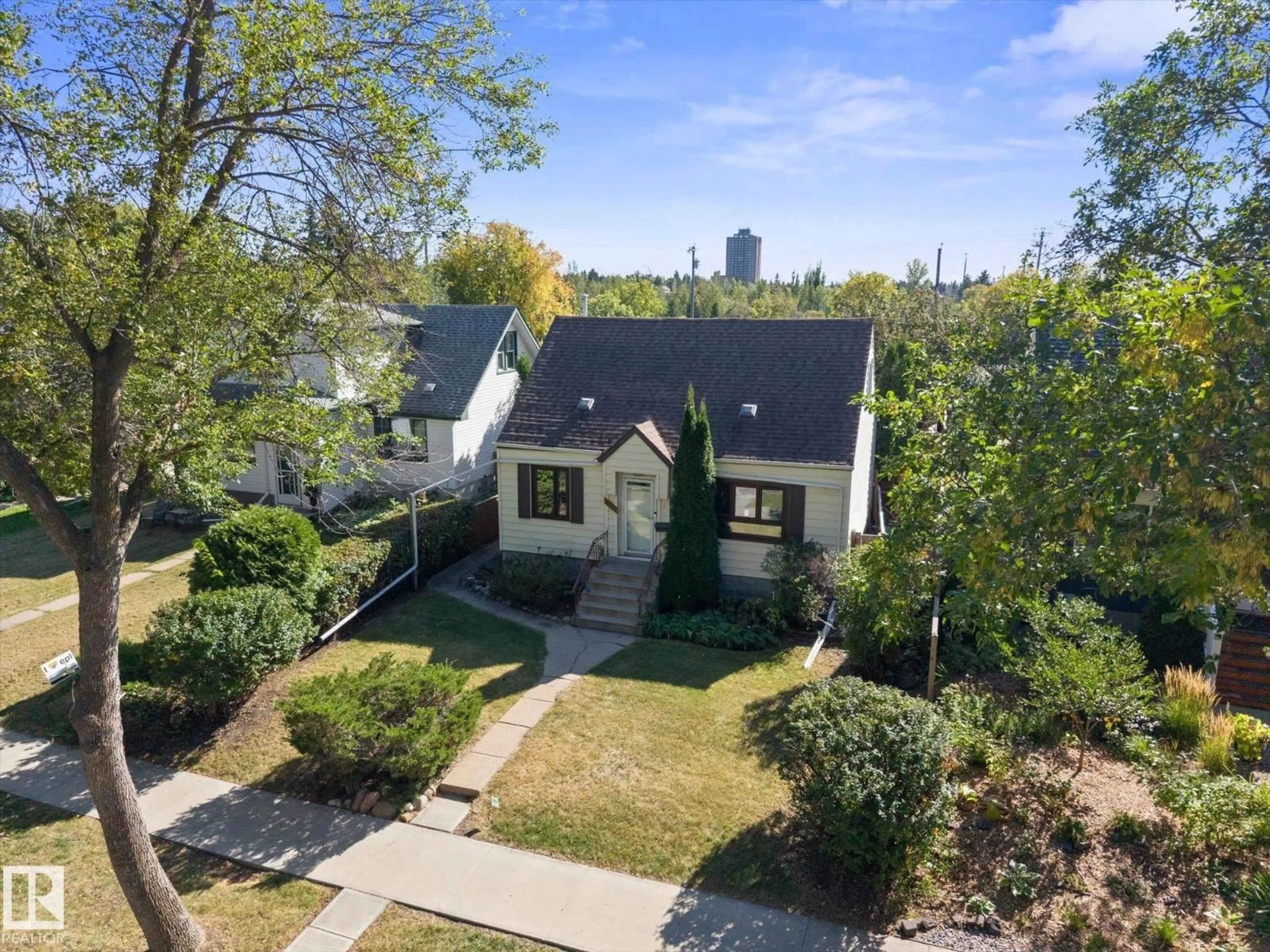A pic from outside/outdoor area/front of a property/back of a property/a pic from drone, street for 11119 62 AV, Edmonton Alberta T6H1N3
