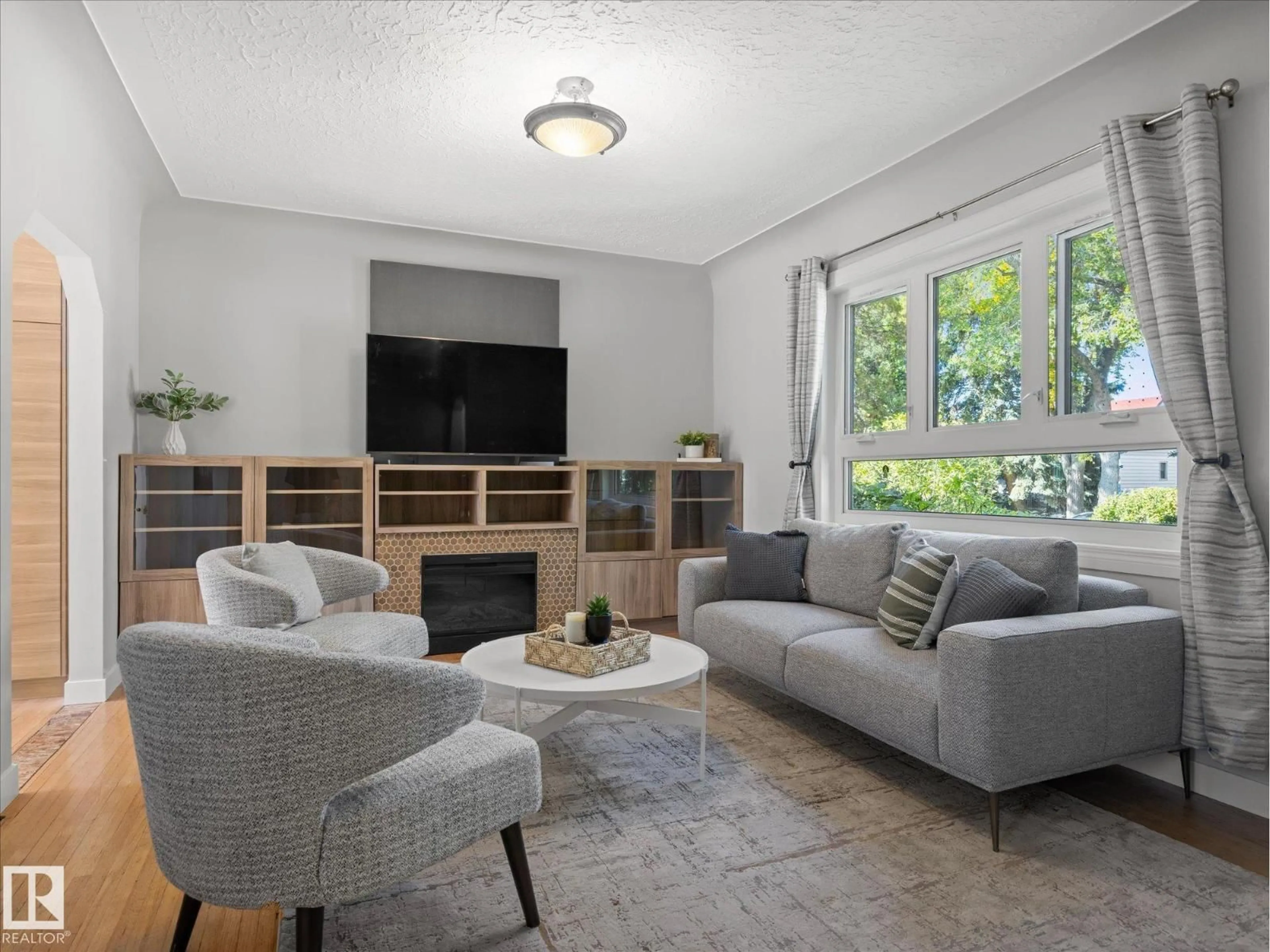 Living room with furniture, unknown for 11119 62 AV, Edmonton Alberta T6H1N3