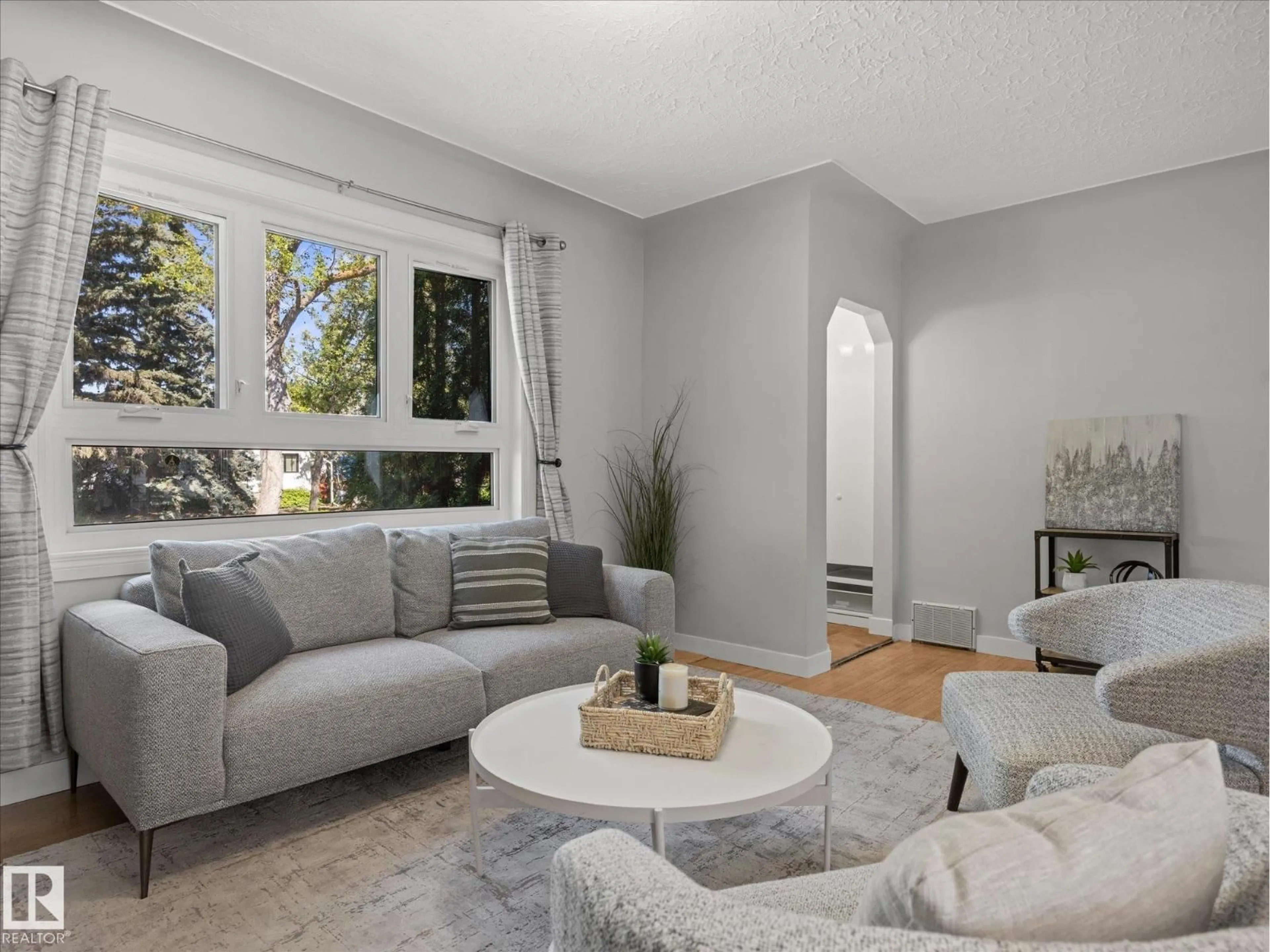Living room with furniture, unknown for 11119 62 AV, Edmonton Alberta T6H1N3