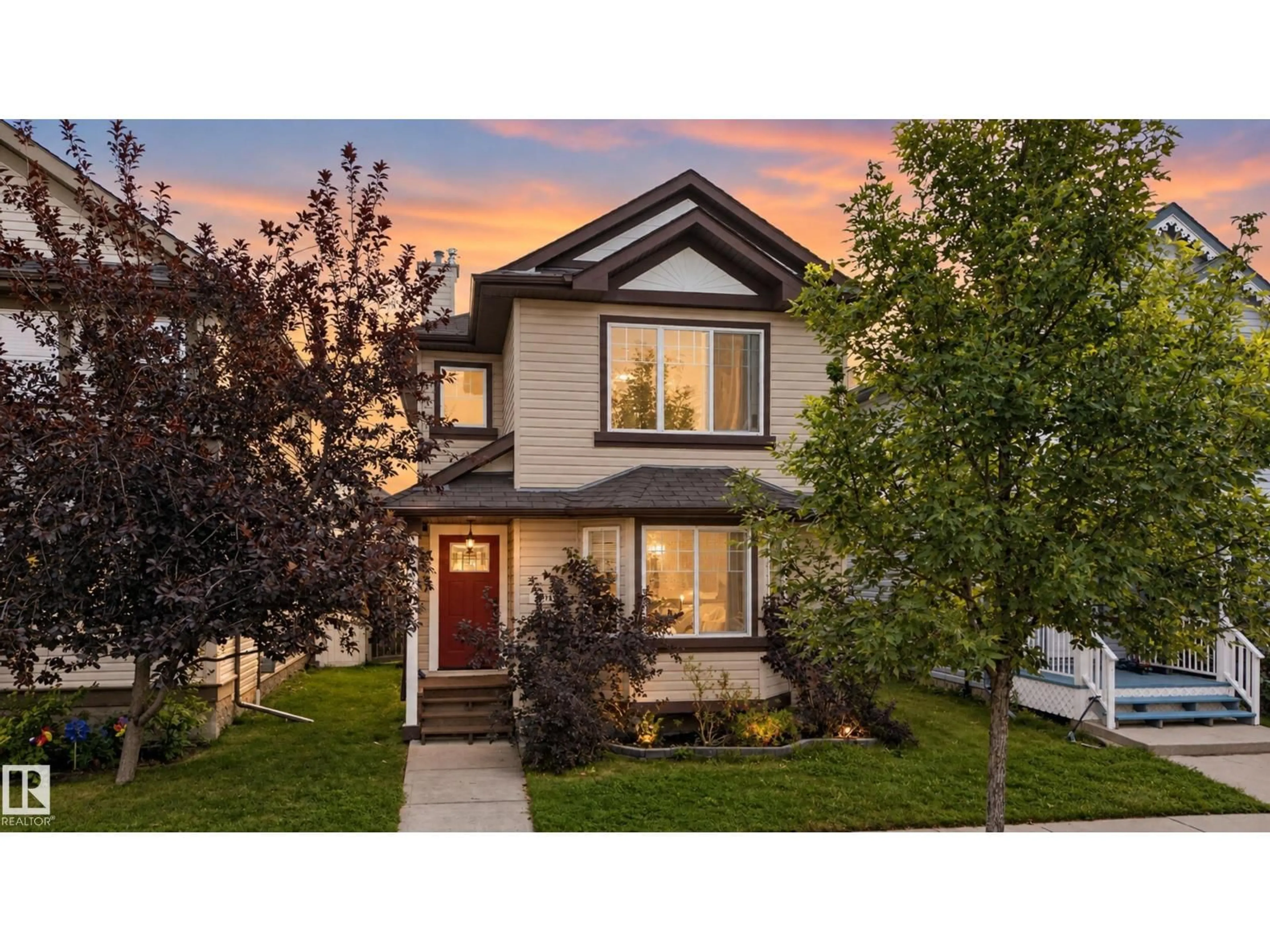 Home with vinyl exterior material, street for 7817 SCHMID PL, Edmonton Alberta T6R0K8
