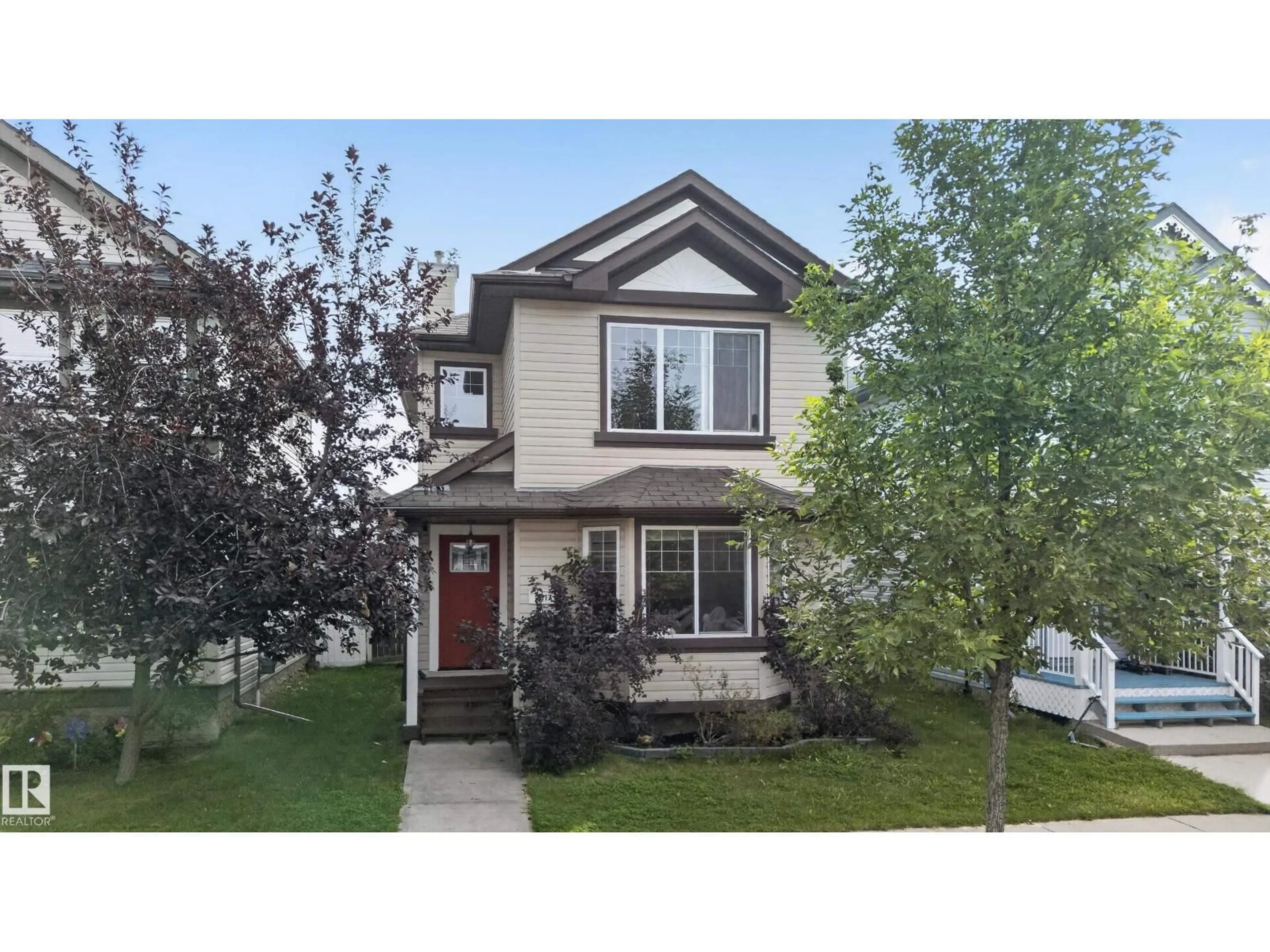 Home with vinyl exterior material, street for 7817 SCHMID PL, Edmonton Alberta T6R0K8