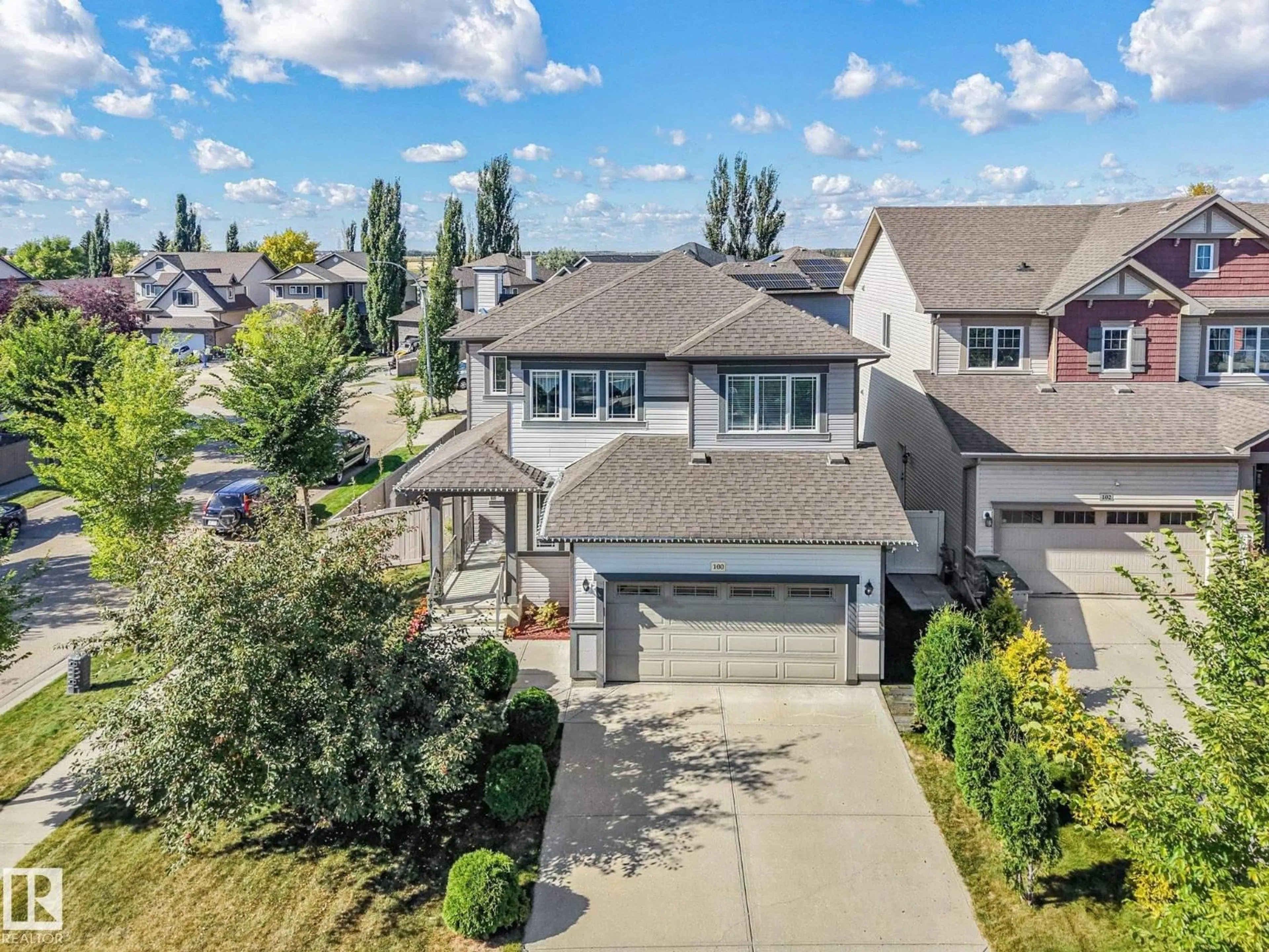 A pic from outside/outdoor area/front of a property/back of a property/a pic from drone, street for 100 RIDEAU PL, Beaumont Alberta T4X1Z6