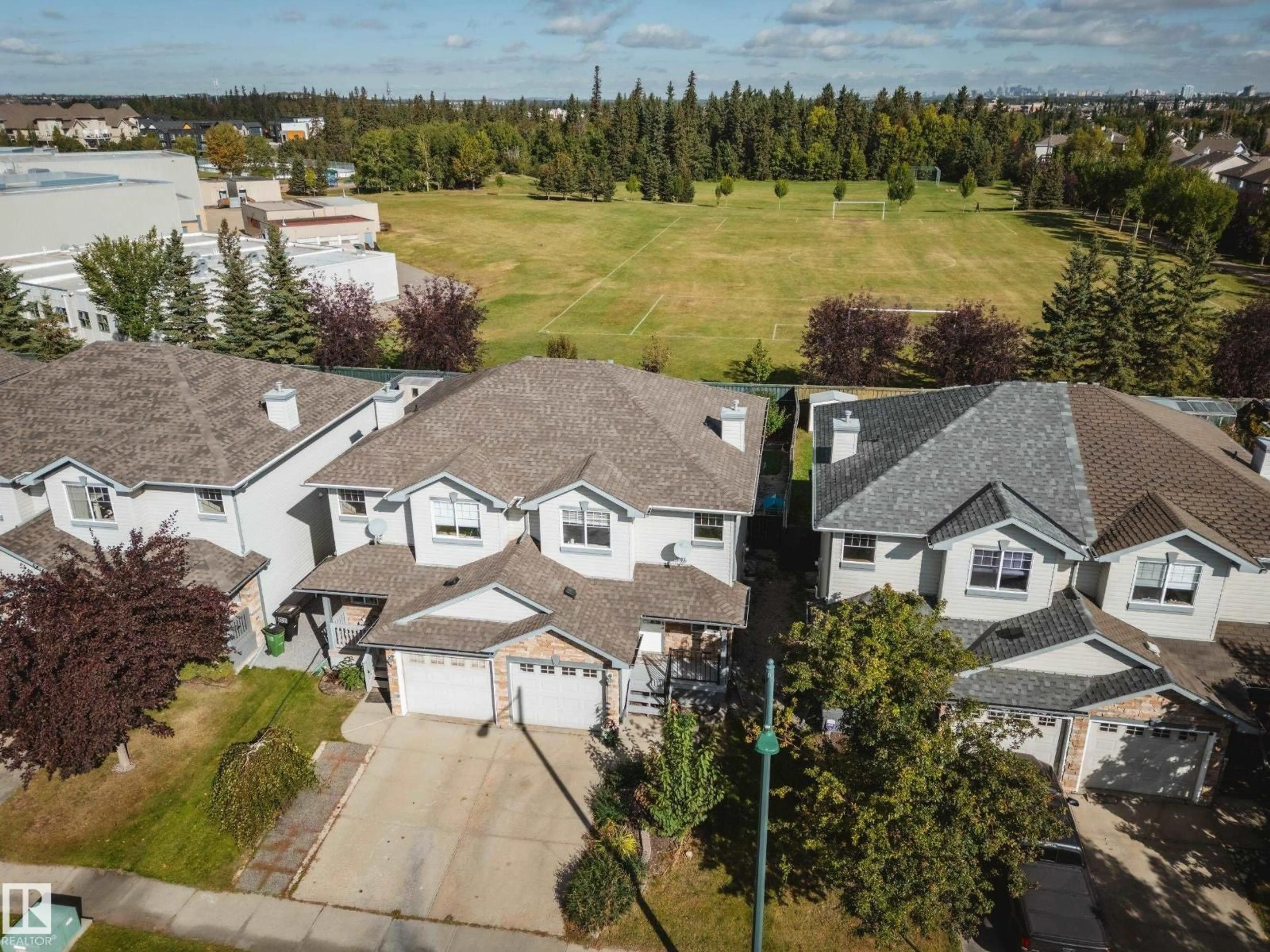 A pic from outside/outdoor area/front of a property/back of a property/a pic from drone, street for 12218 16 AV, Edmonton Alberta T6W1L7