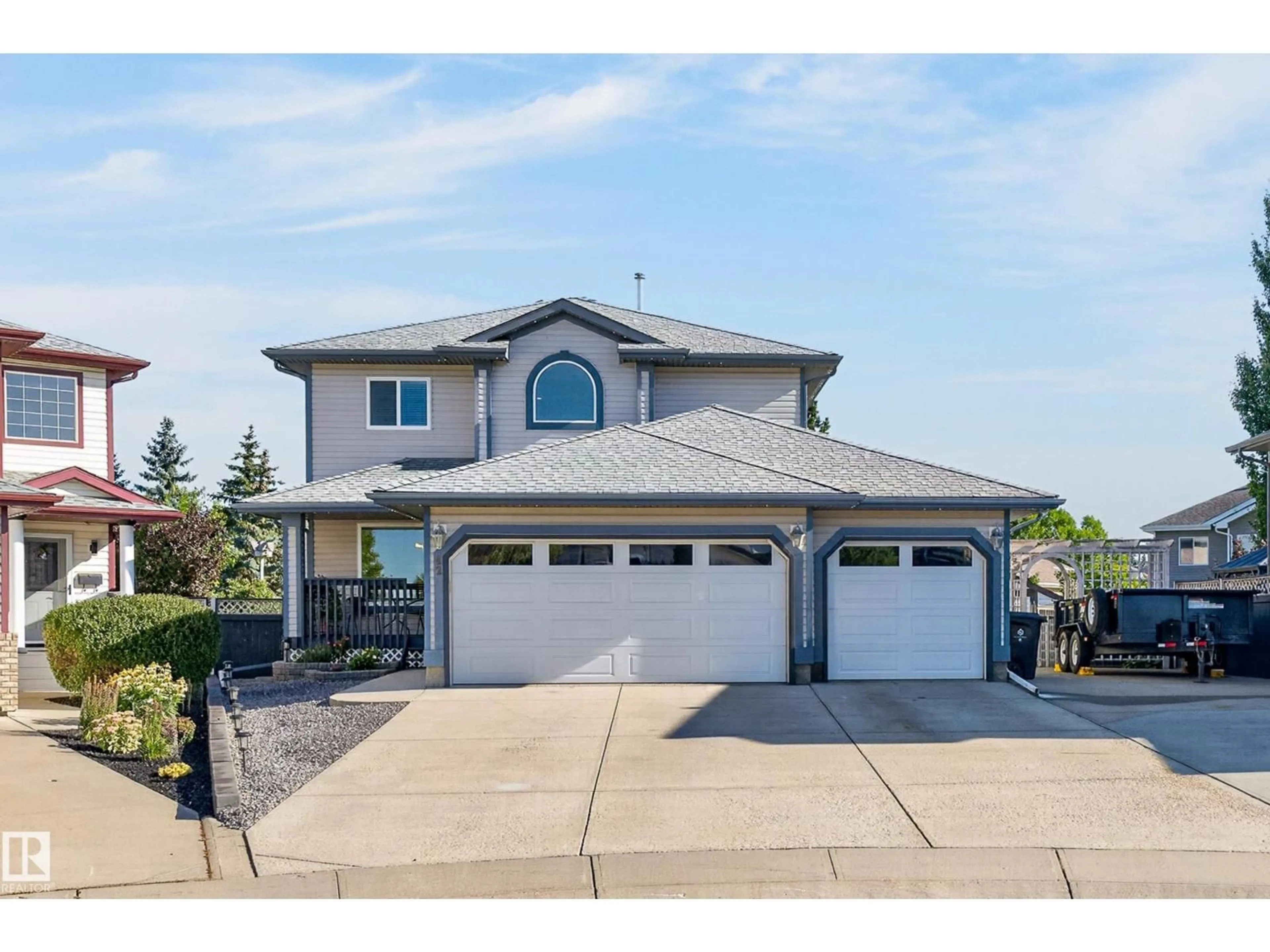 Home with vinyl exterior material, street for 42 WESTWOOD WD, Fort Saskatchewan Alberta T8L4L3