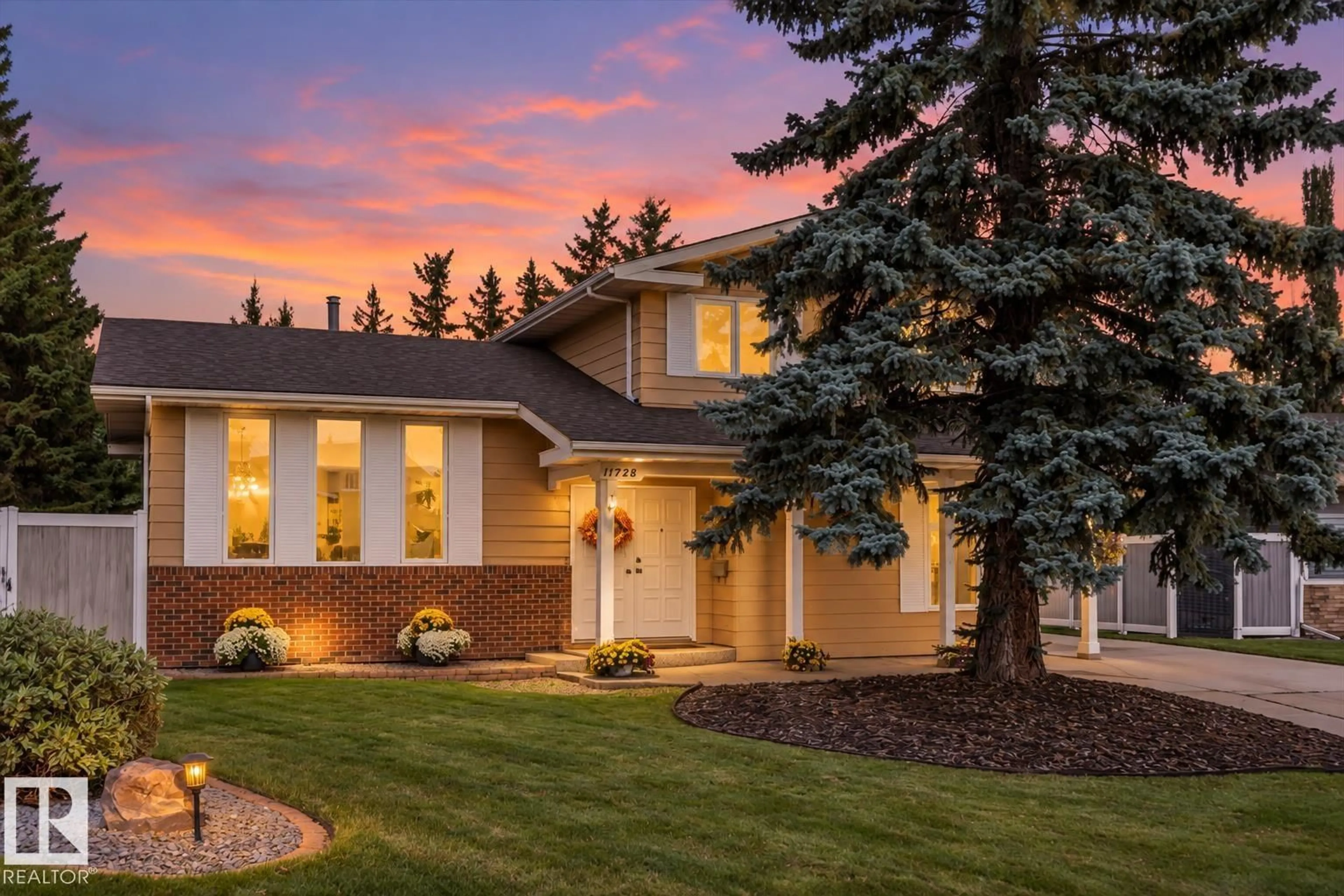Home with brick exterior material, street for 11728 33A AV, Edmonton Alberta T6J3H4