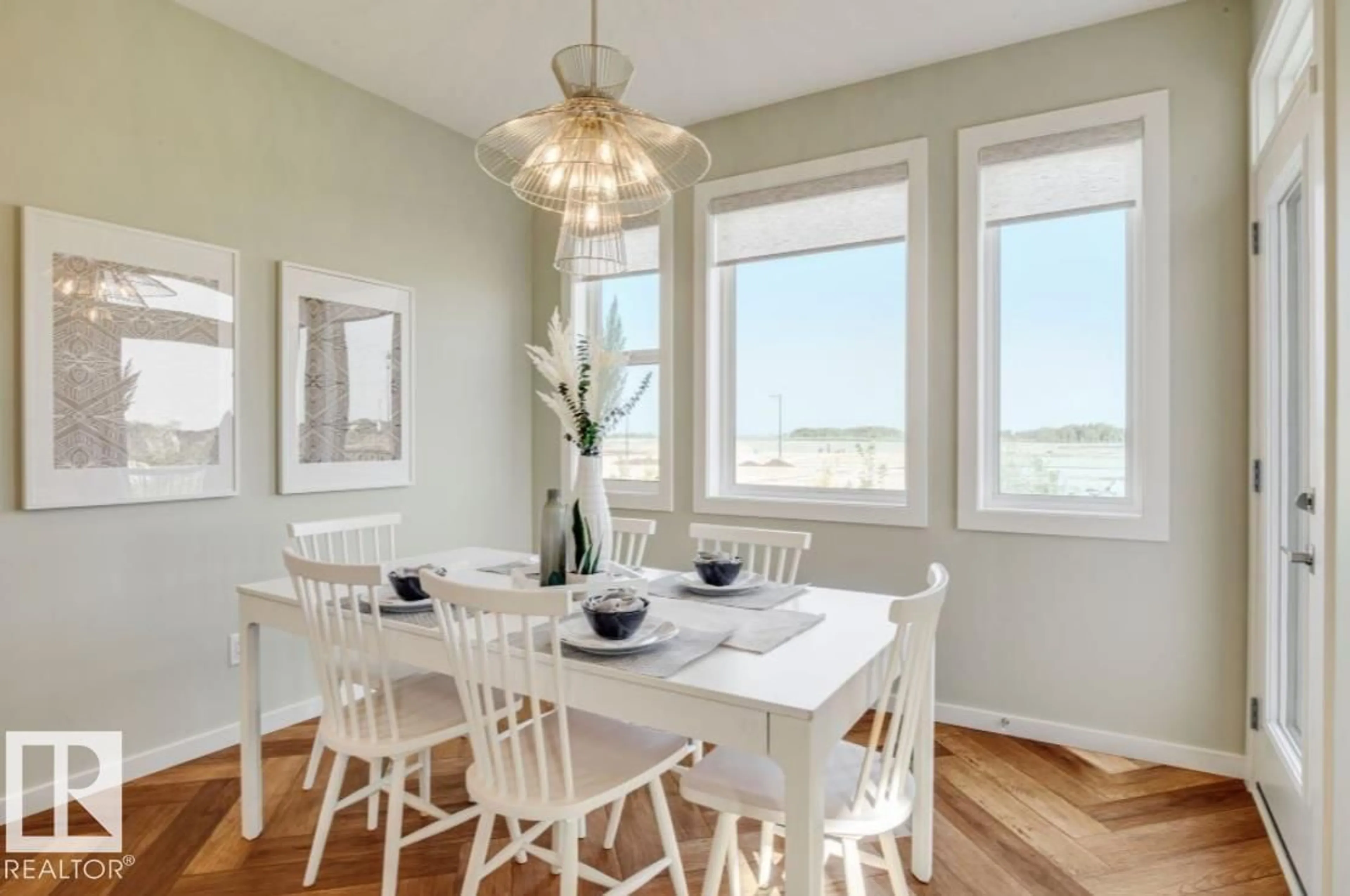 Dining room, wood/laminate floor for 2345 MUCKLEPLUM WY, Edmonton Alberta T6X3J9