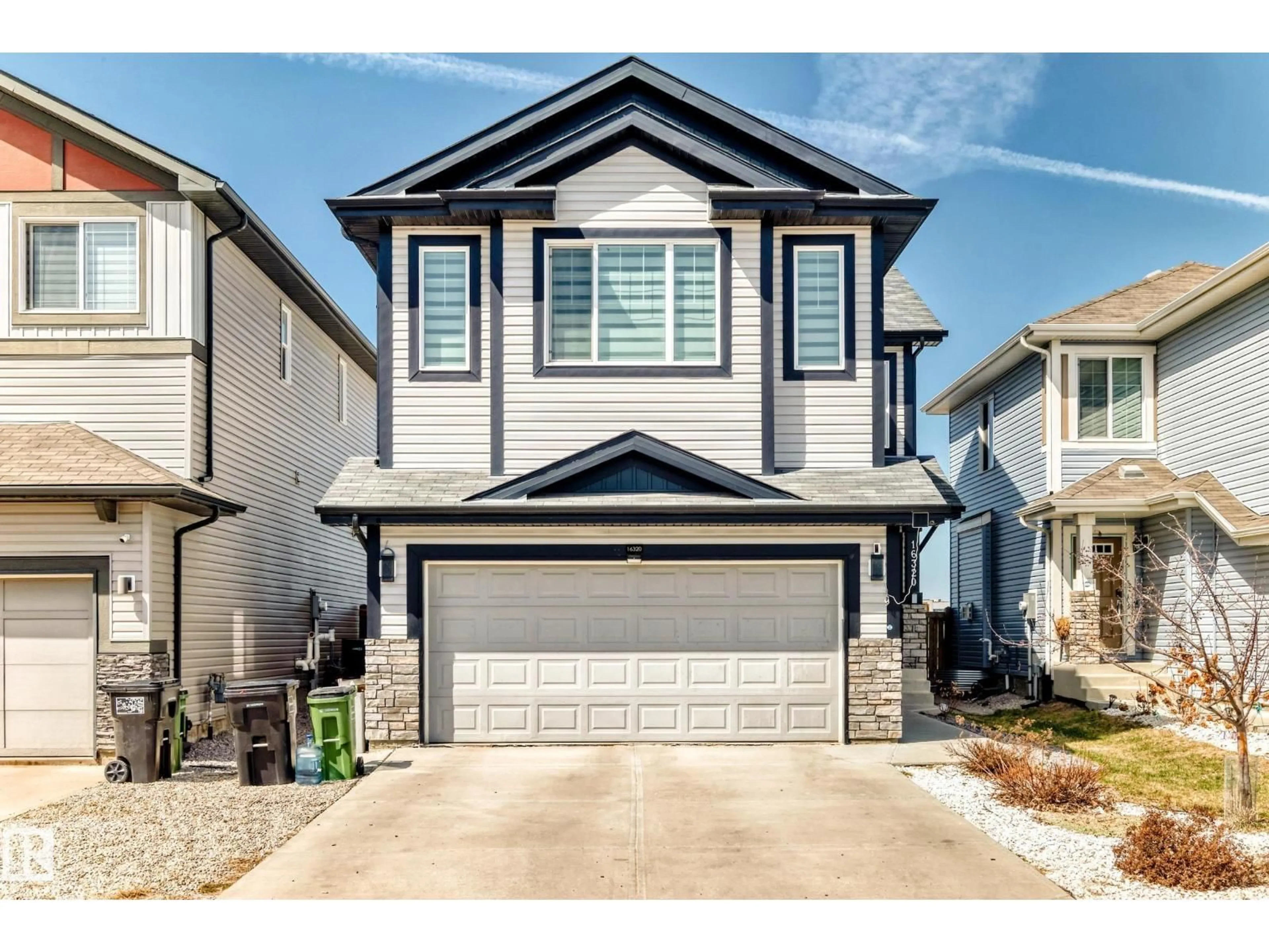 Home with vinyl exterior material, street for SW - 16320 12 AV, Edmonton Alberta T6W3K4