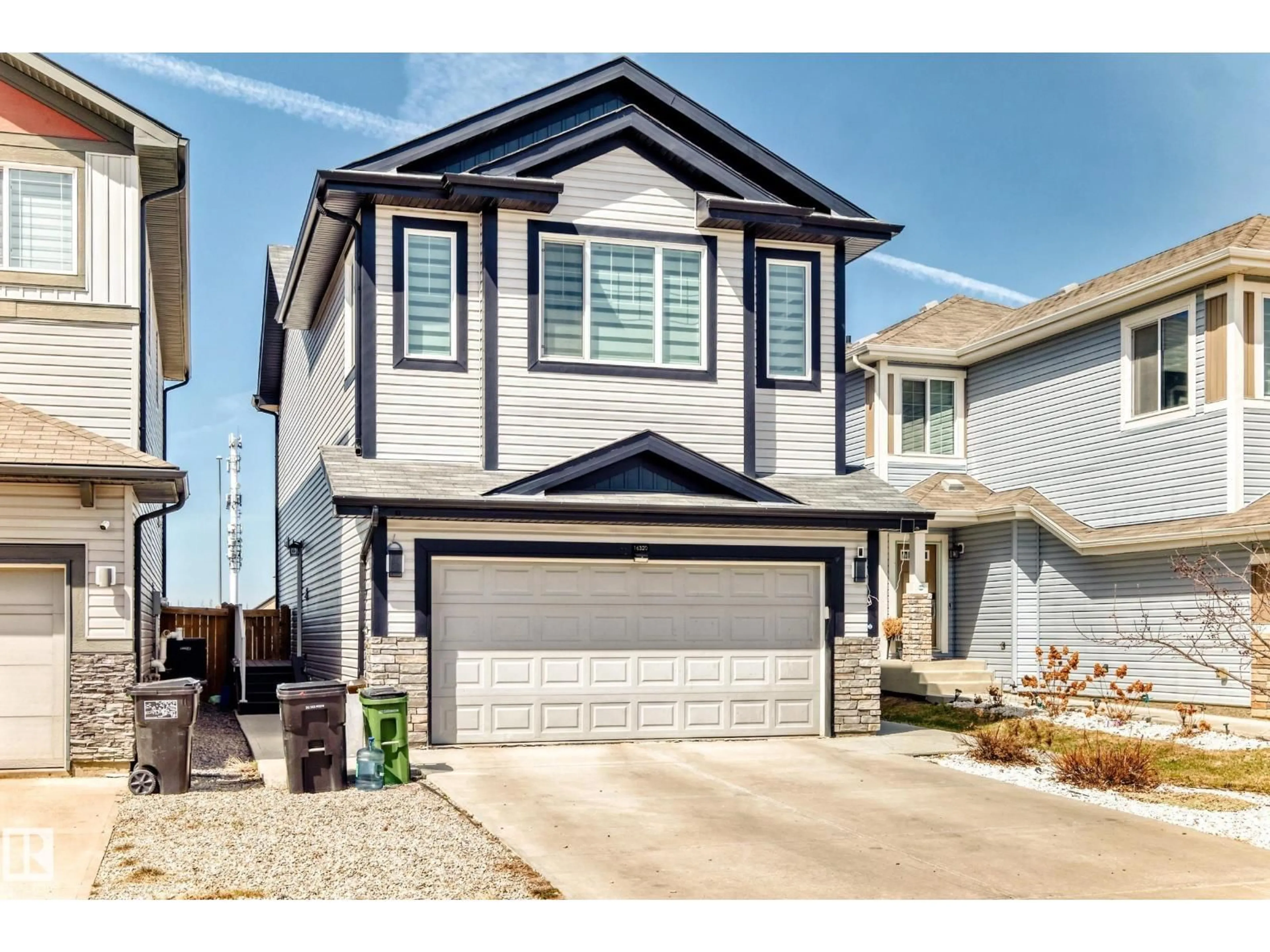 Home with vinyl exterior material, street for SW - 16320 12 AV, Edmonton Alberta T6W3K4