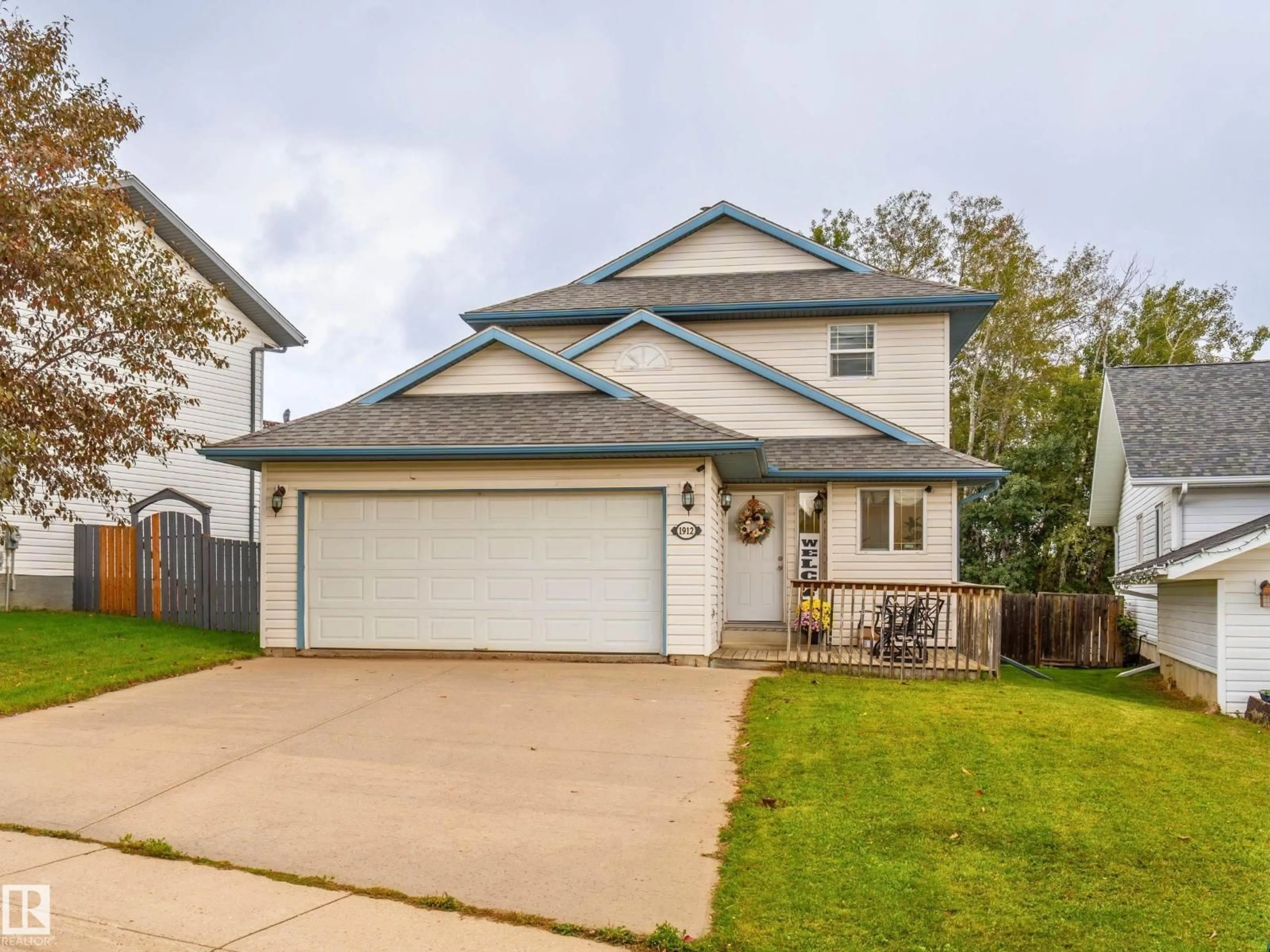 Home with vinyl exterior material, street for 1912 6 ST, Cold Lake Alberta T9M1M3