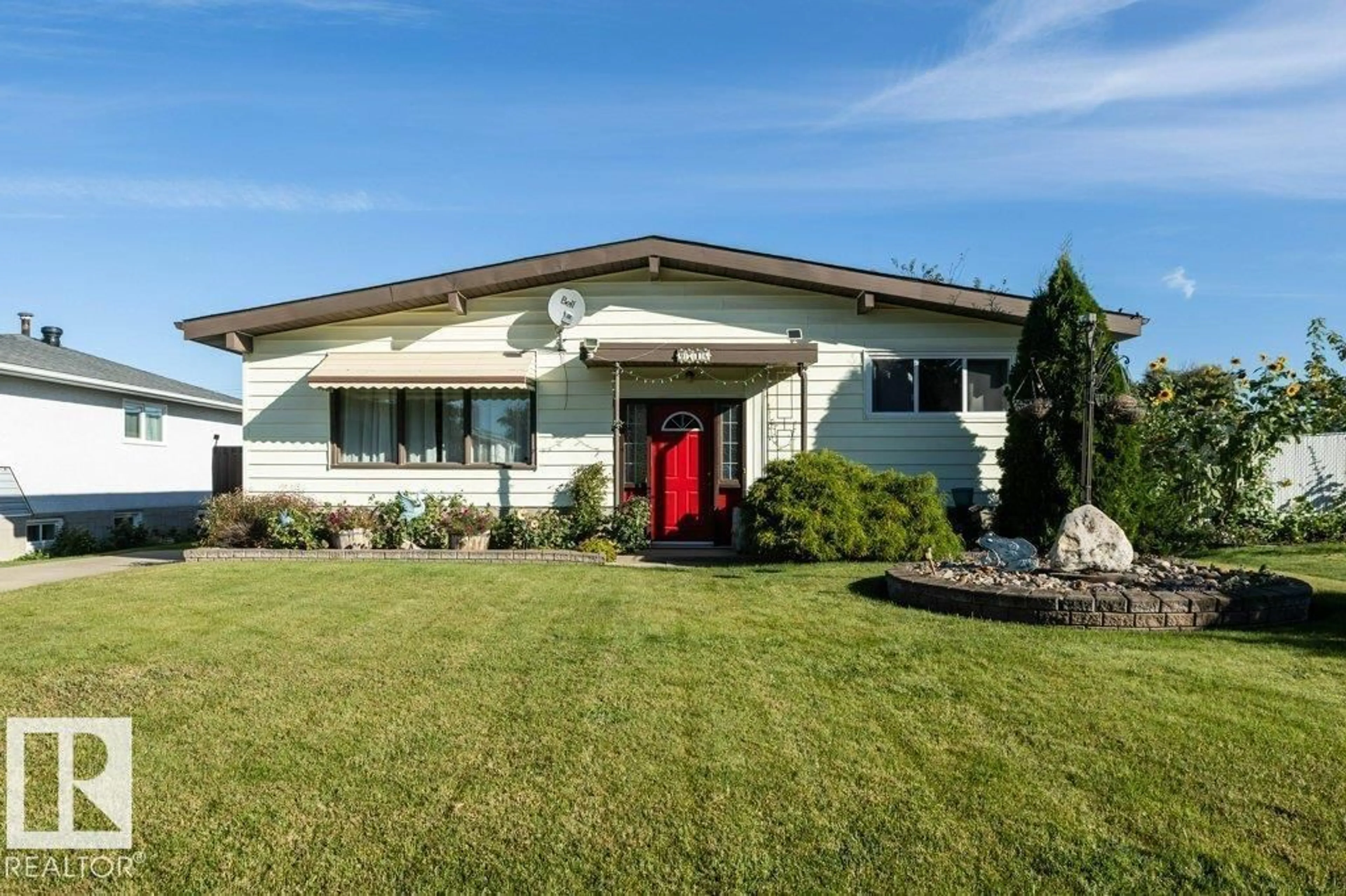 Home with vinyl exterior material, street for 9716 99 ST, Westlock Alberta T7P1Y4