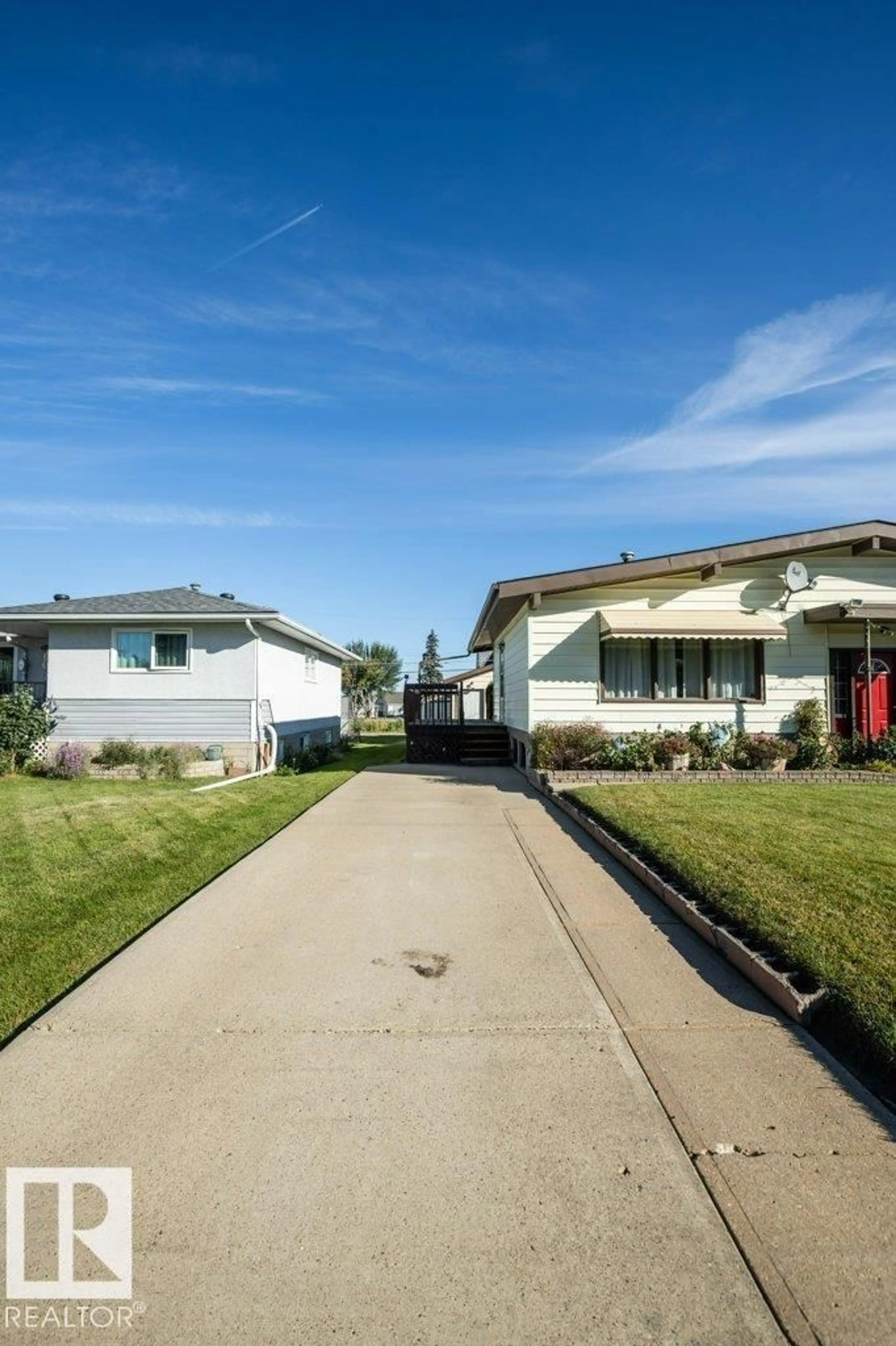Home with vinyl exterior material, street for 9716 99 ST, Westlock Alberta T7P1Y4