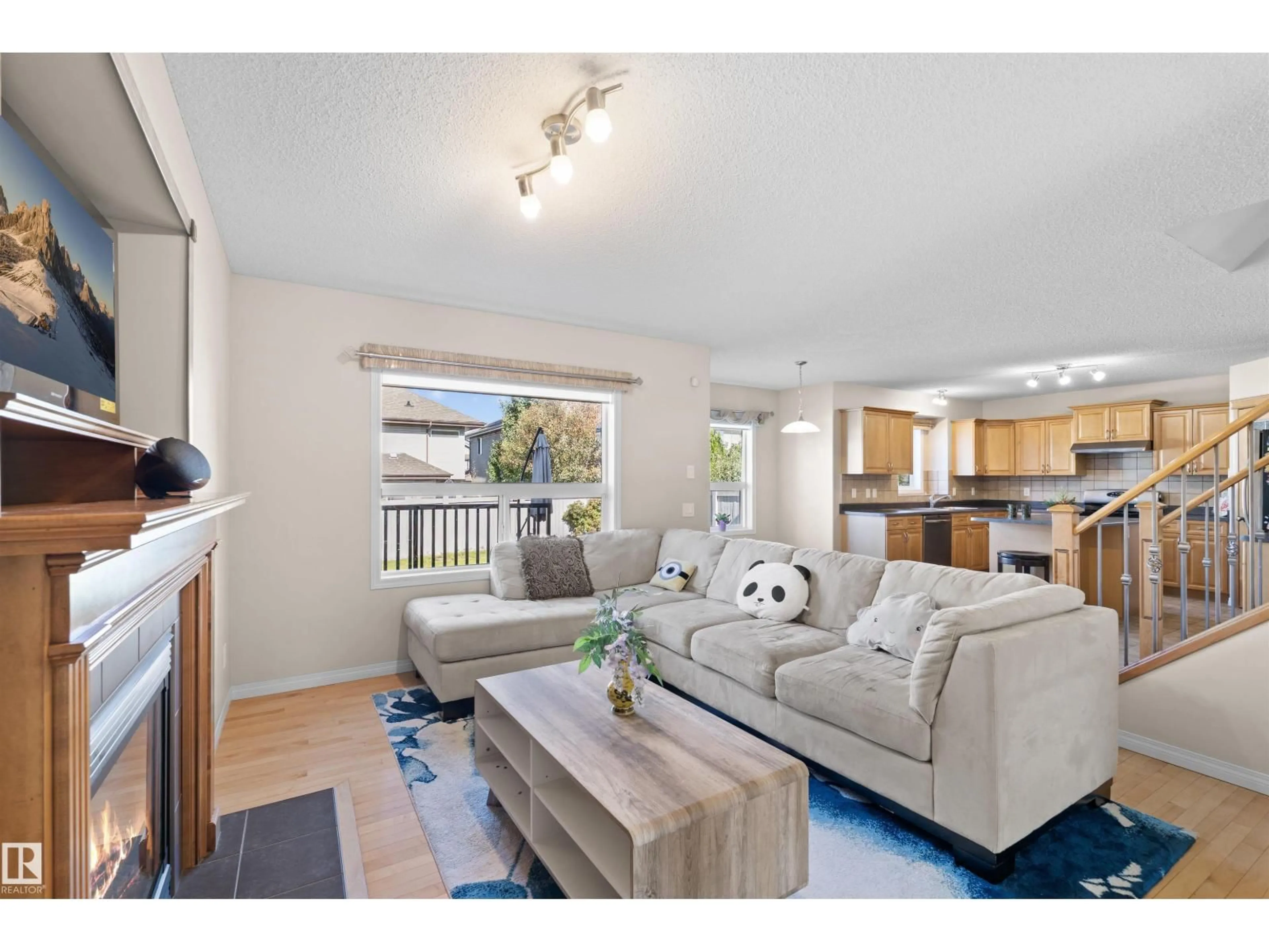 Living room with furniture, unknown for NW - 20616 56 AV, Edmonton Alberta T6M0B6