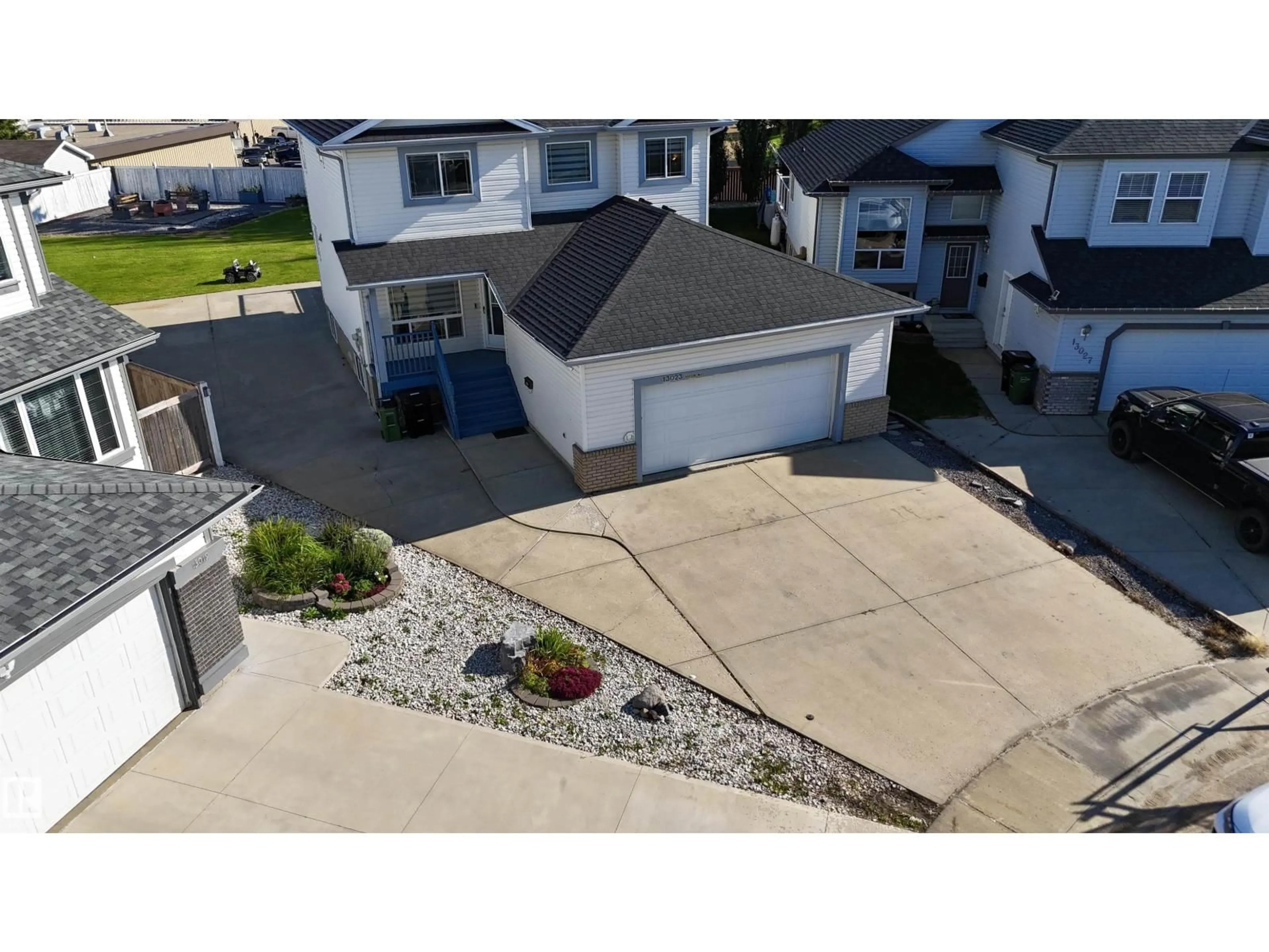 A pic from outside/outdoor area/front of a property/back of a property/a pic from drone, street for 13023 HUDSON WY, Edmonton Alberta T6V1M4