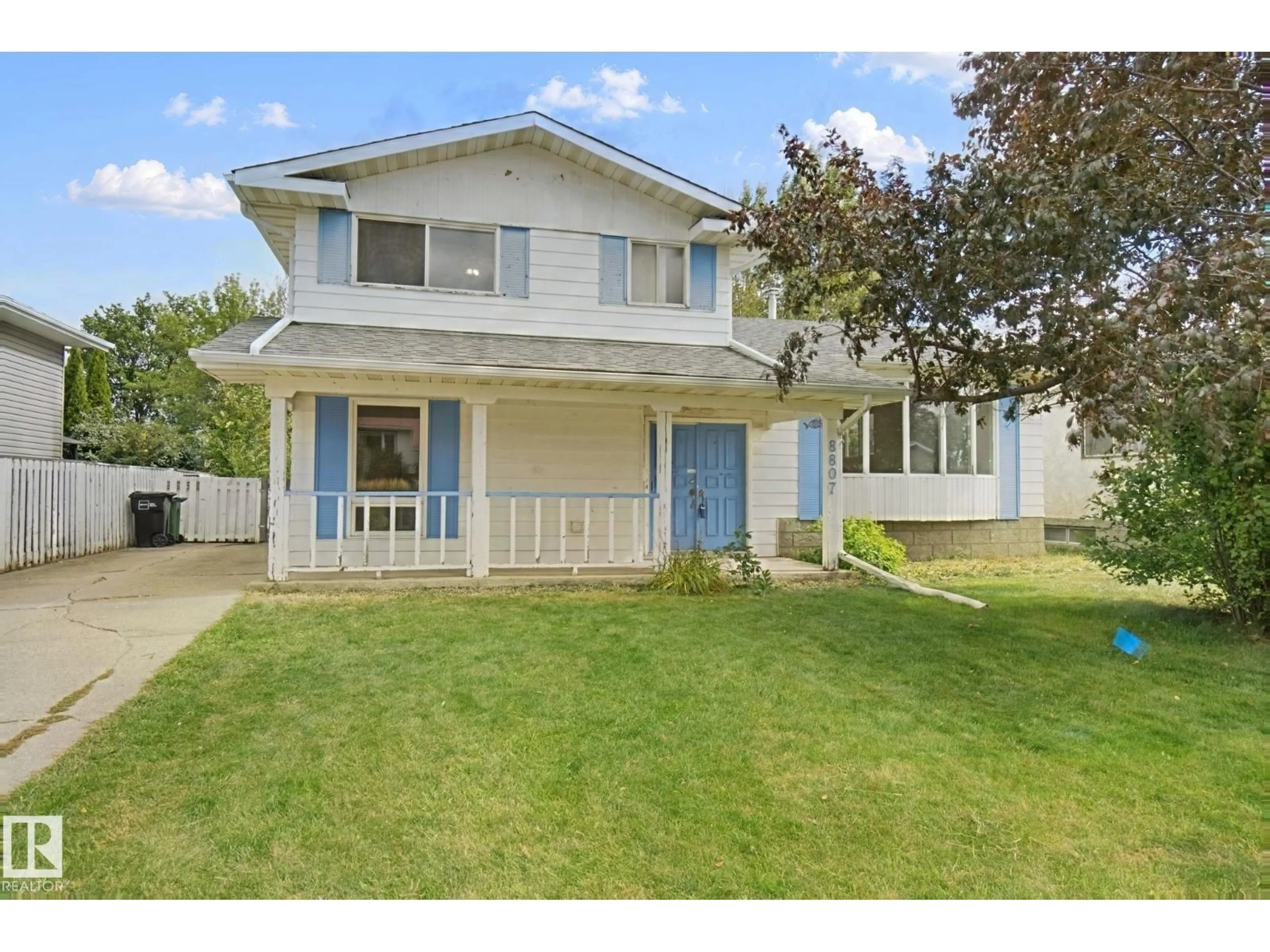 Home with vinyl exterior material, street for NW - 8807 181 ST, Edmonton Alberta T5T0Y5