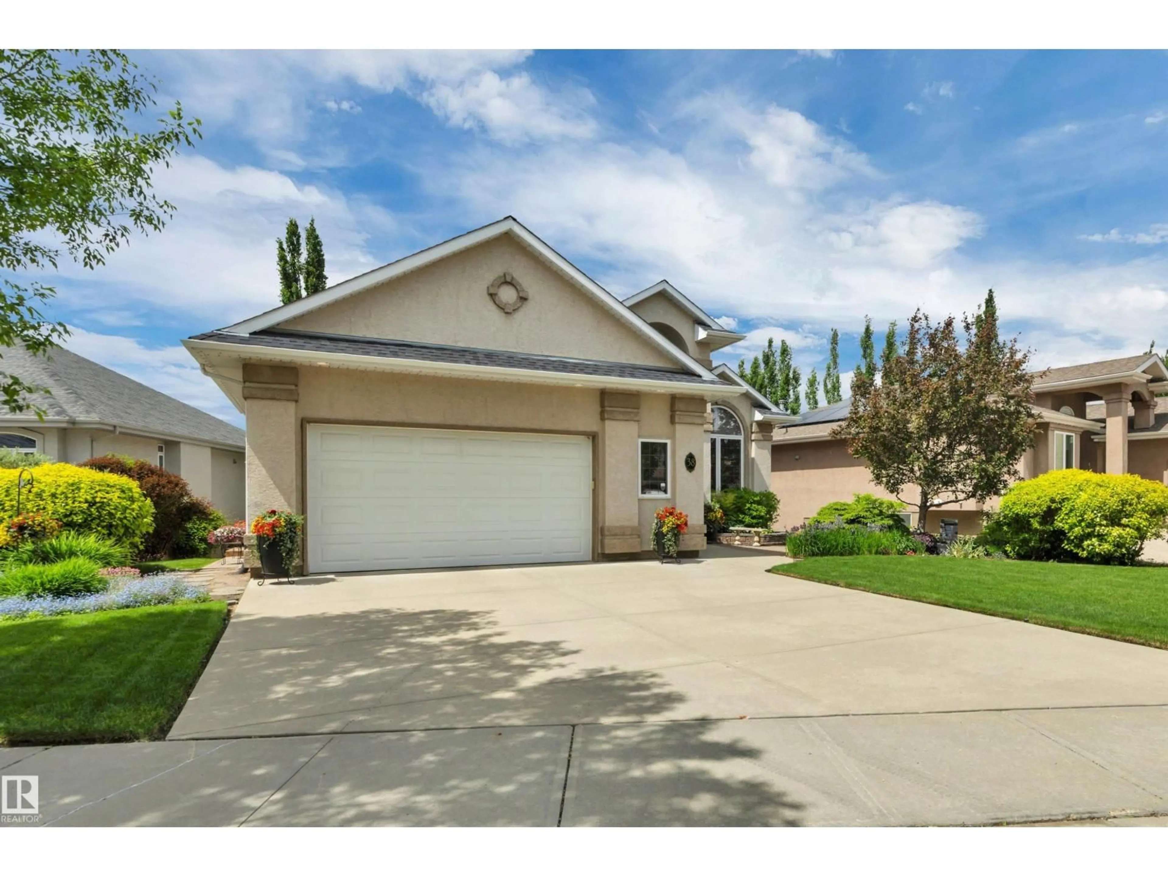 Home with vinyl exterior material, street for 38 SHORES DR, Leduc Alberta T9E8N7