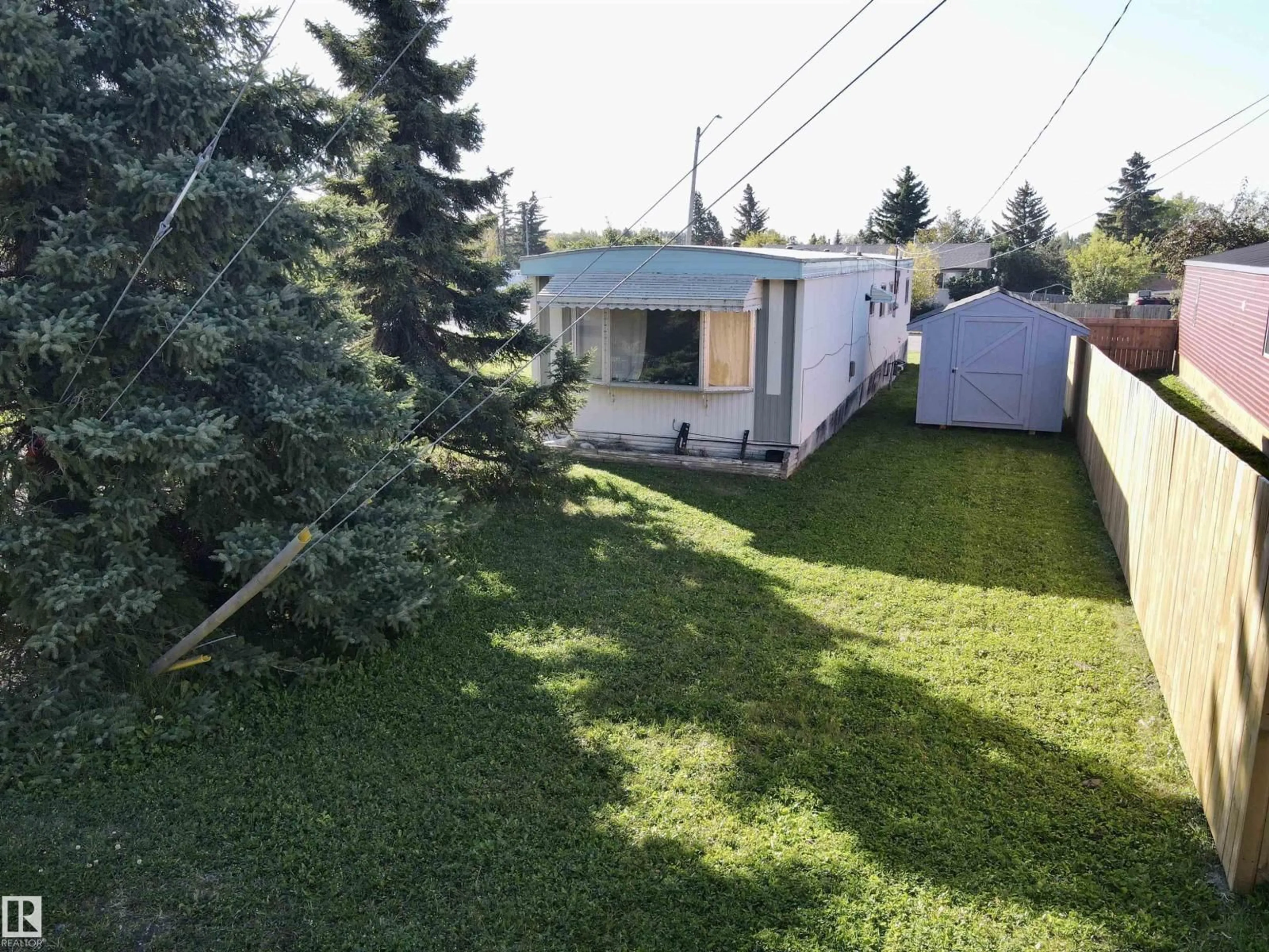 A pic from outside/outdoor area/front of a property/back of a property/a pic from drone, street for 5404 47 AV, Drayton Valley Alberta T7A1K7
