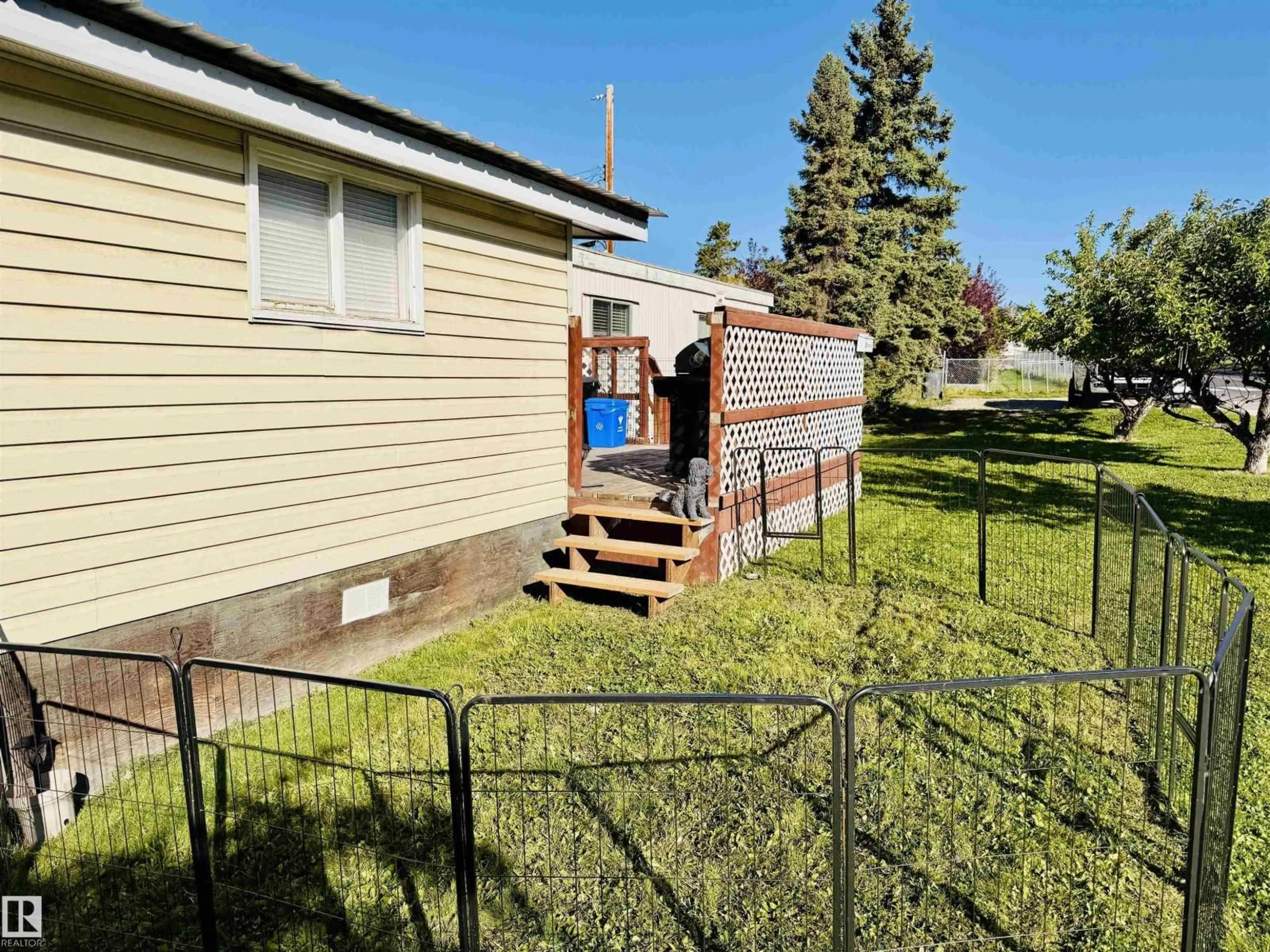 A pic from outside/outdoor area/front of a property/back of a property/a pic from drone, street for 5404 47 AV, Drayton Valley Alberta T7A1K7