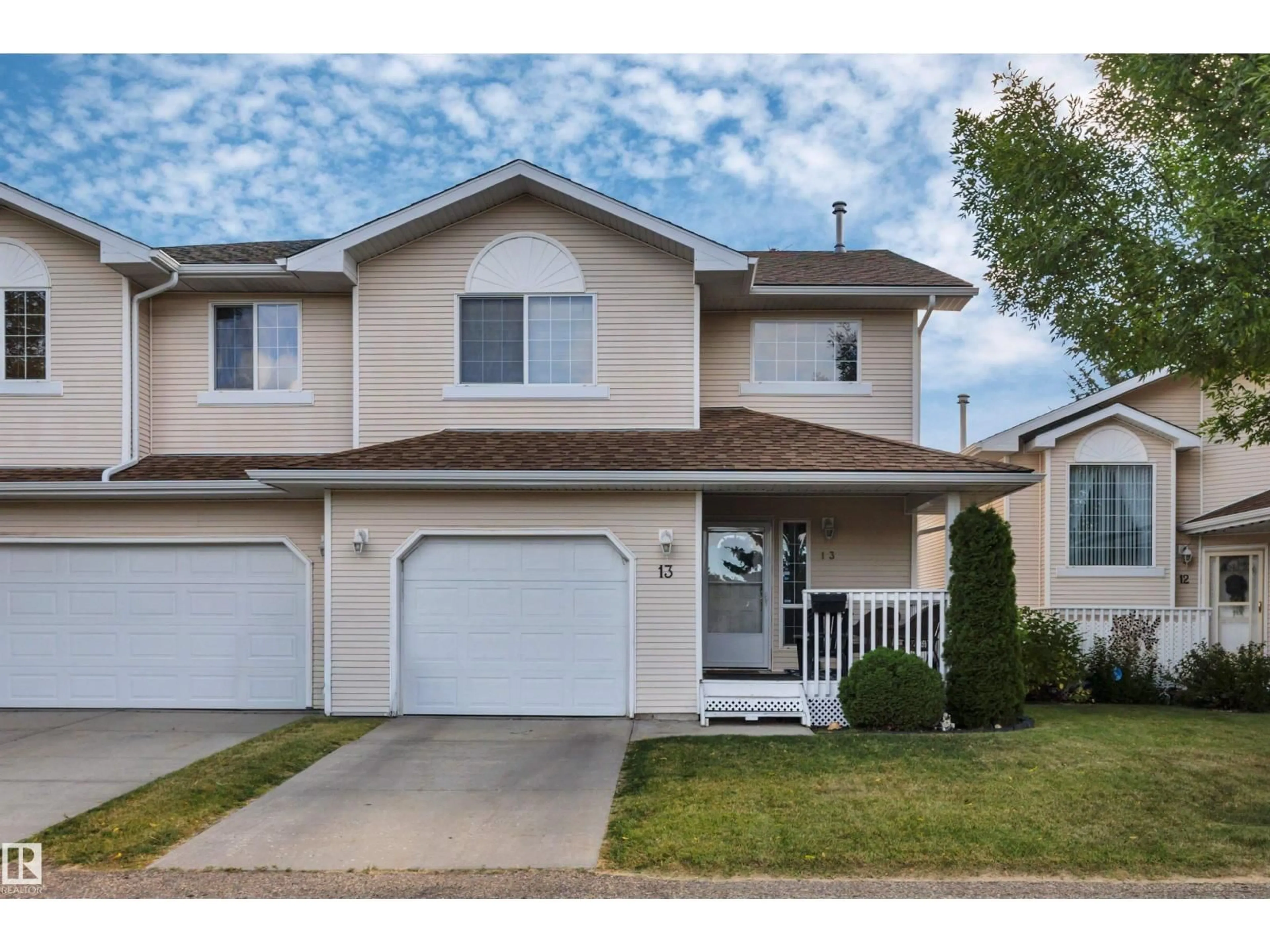 Home with vinyl exterior material, street for #13 - 6608 158 AV, Edmonton Alberta T5Z3H1