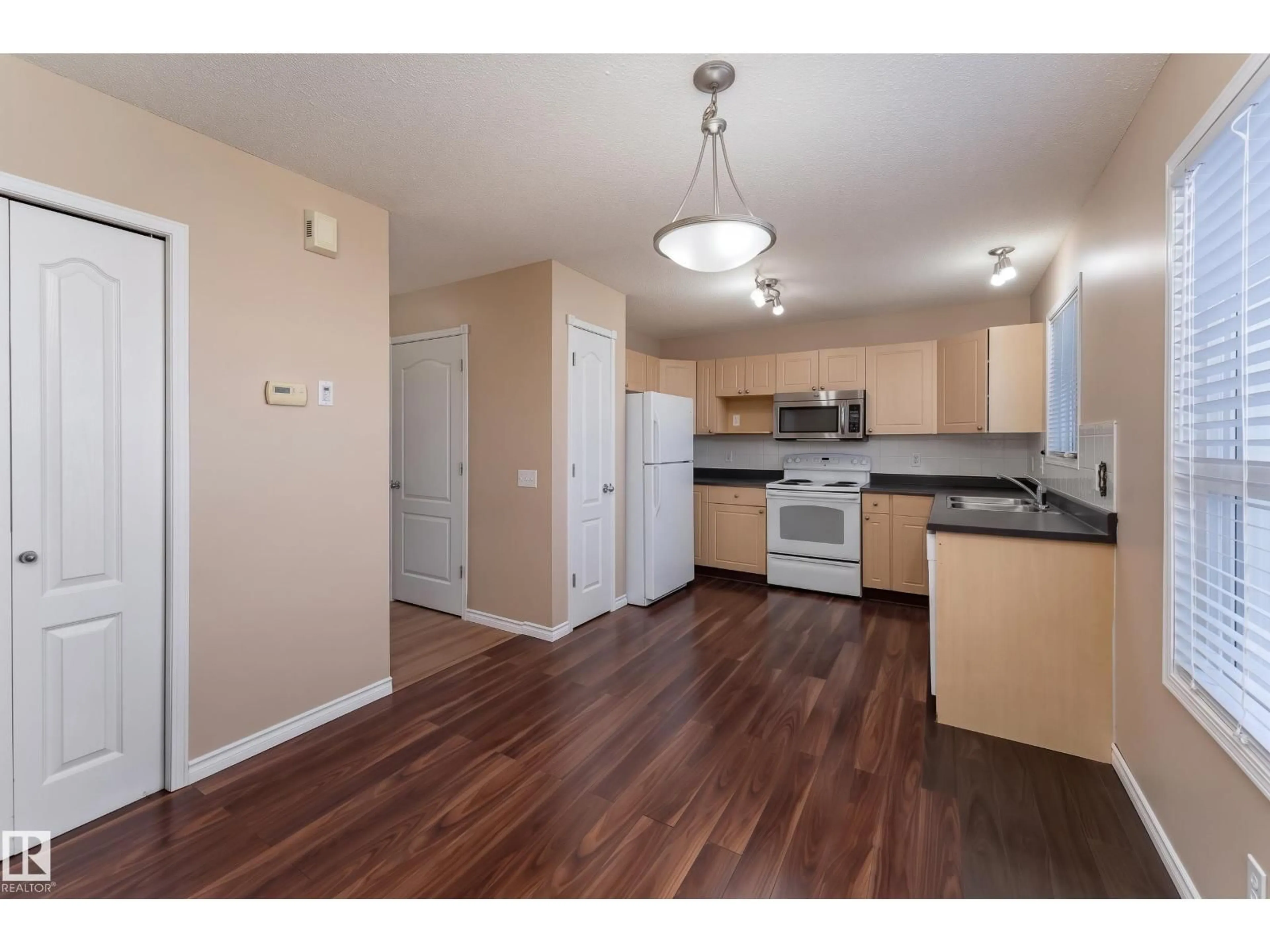 Standard kitchen, wood/laminate floor for 40 BIRCHGLEN CR, Leduc Alberta T9E0C5