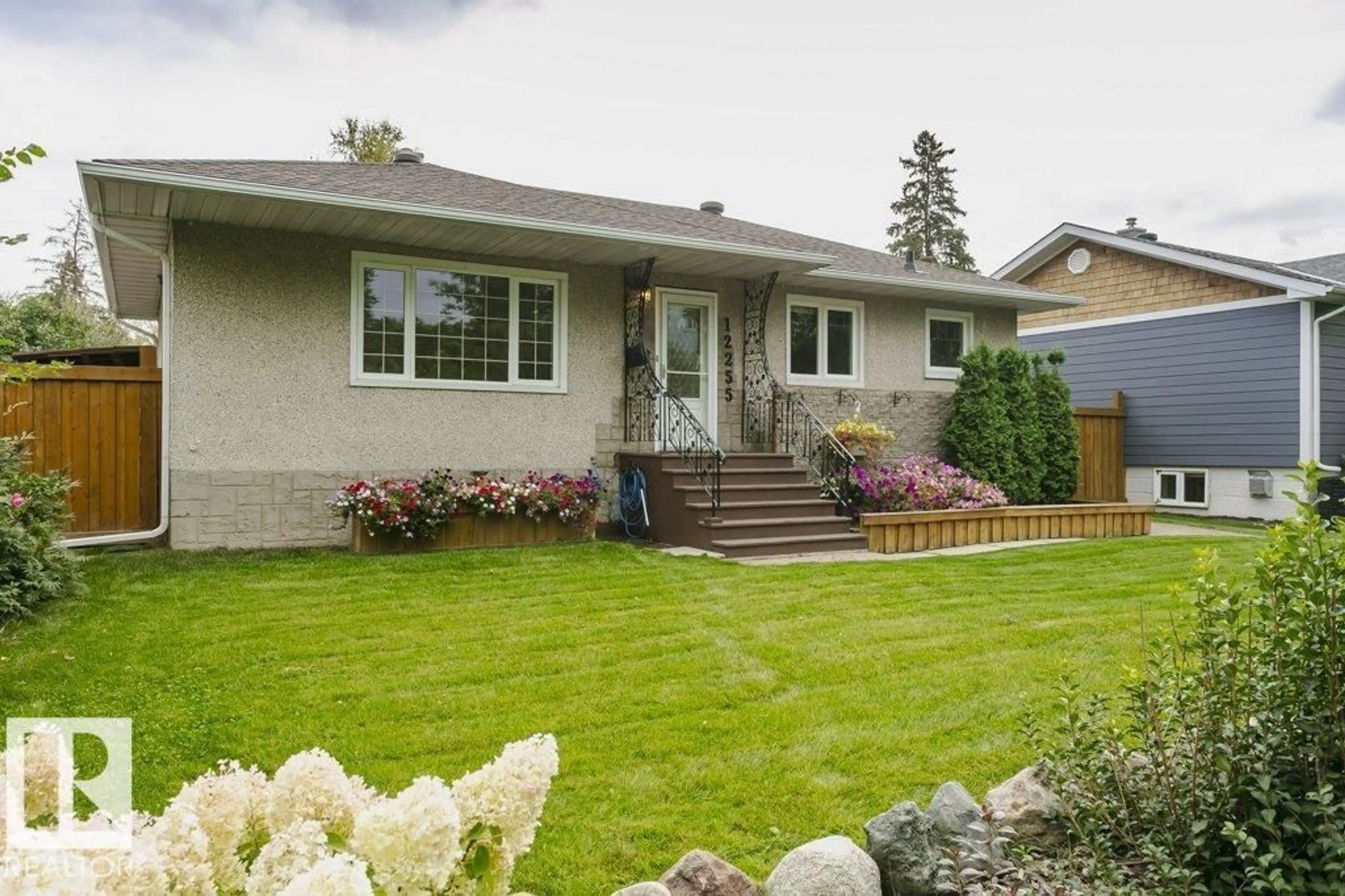 Home with vinyl exterior material, street for 12255 DOVERCOURT CR, Edmonton Alberta T5L4E4