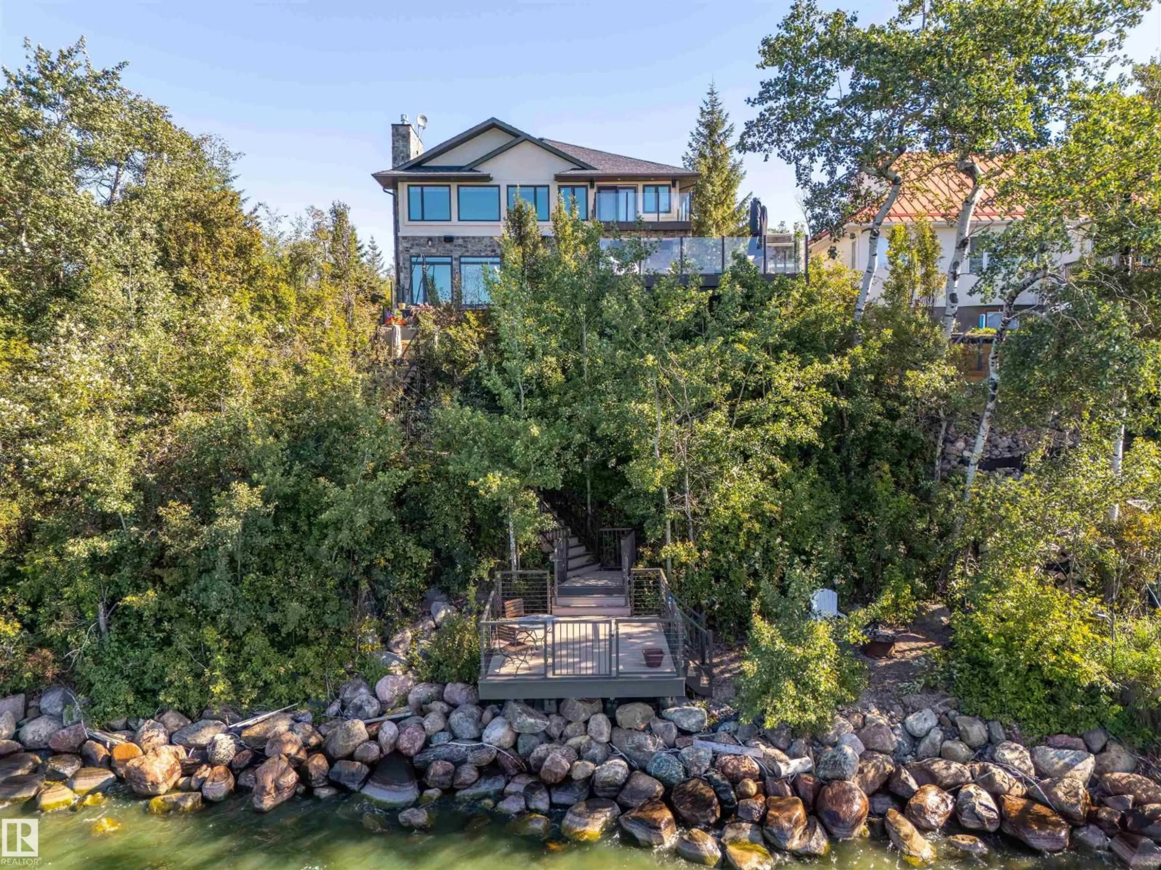 A pic from outside/outdoor area/front of a property/back of a property/a pic from drone, water/lake/river/ocean view for 60528 - 21 RGE RD 464A, Rural Bonnyville M.D. Alberta T9N2J6
