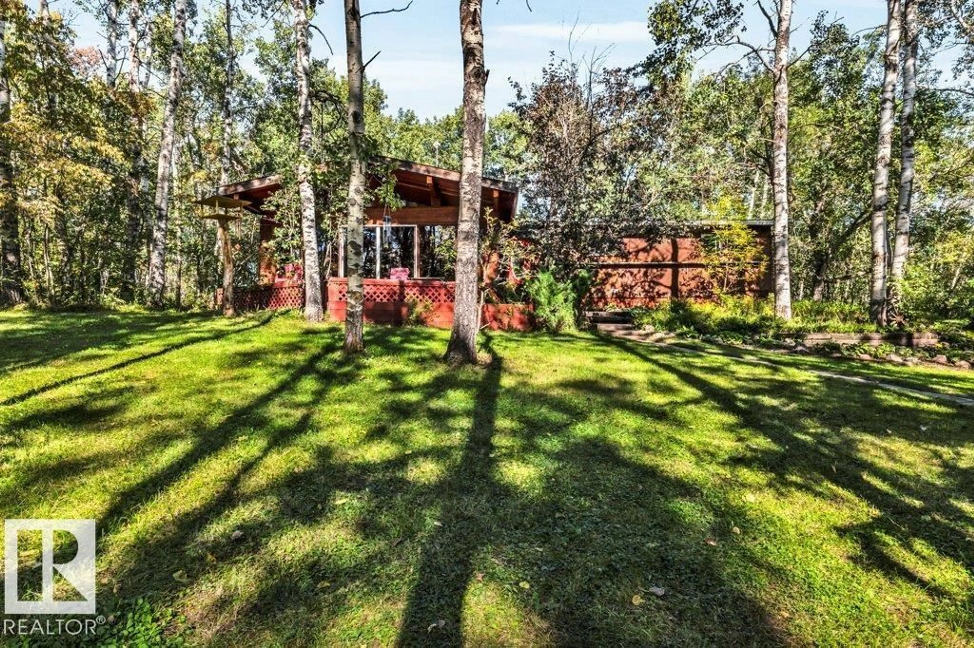 A pic from outside/outdoor area/front of a property/back of a property/a pic from drone, forest/trees view for 10-51119 RGE RD 265, Rural Parkland County Alberta T7Y1E8