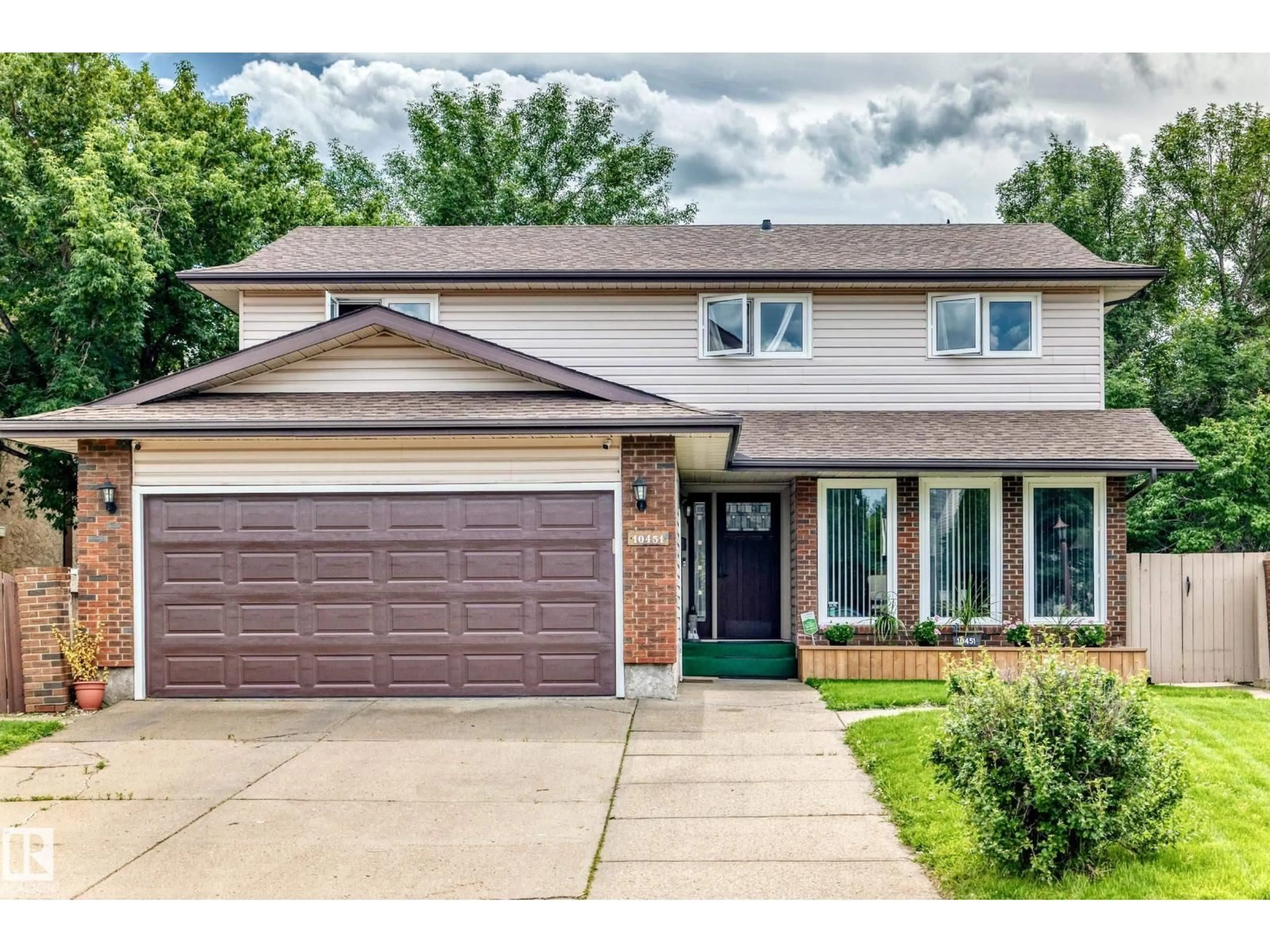 Home with brick exterior material, street for 10451 26 AV, Edmonton Alberta T6J4K1