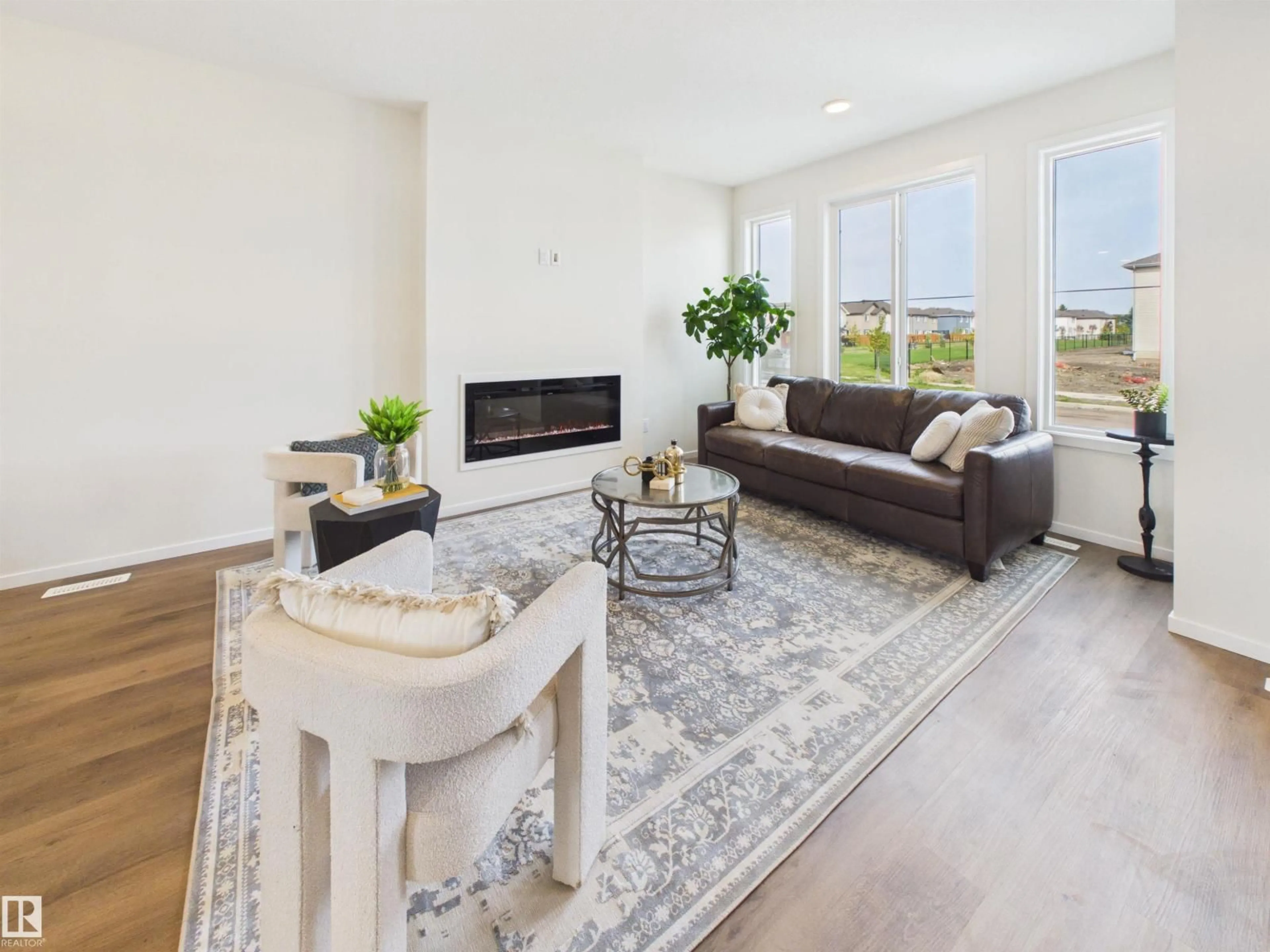 Living room with furniture, unknown for 87 SERENO LN, Fort Saskatchewan Alberta T8L0Z9